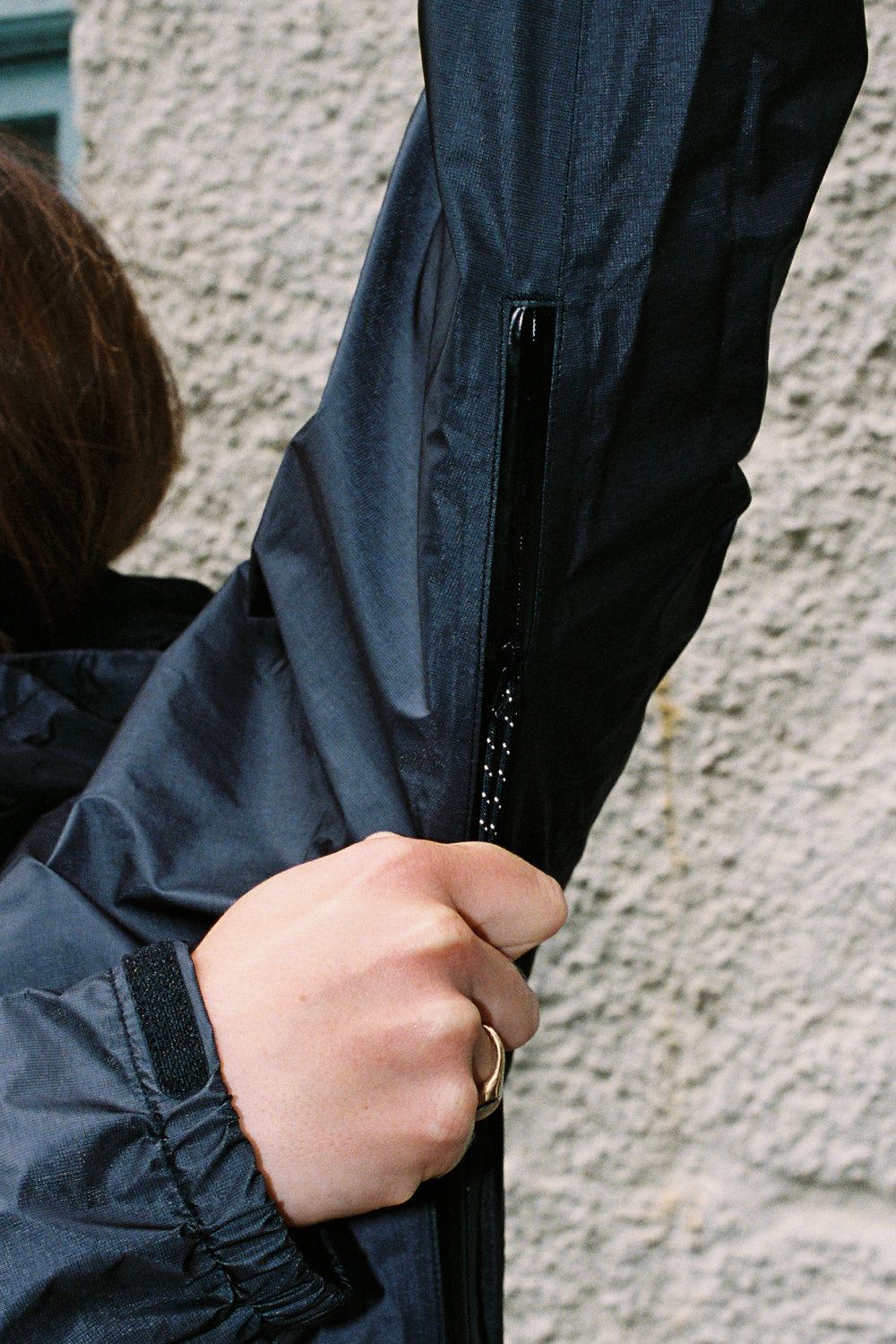US Women's Versalite Jacket black sleeve detail showing zipper and fabric quality