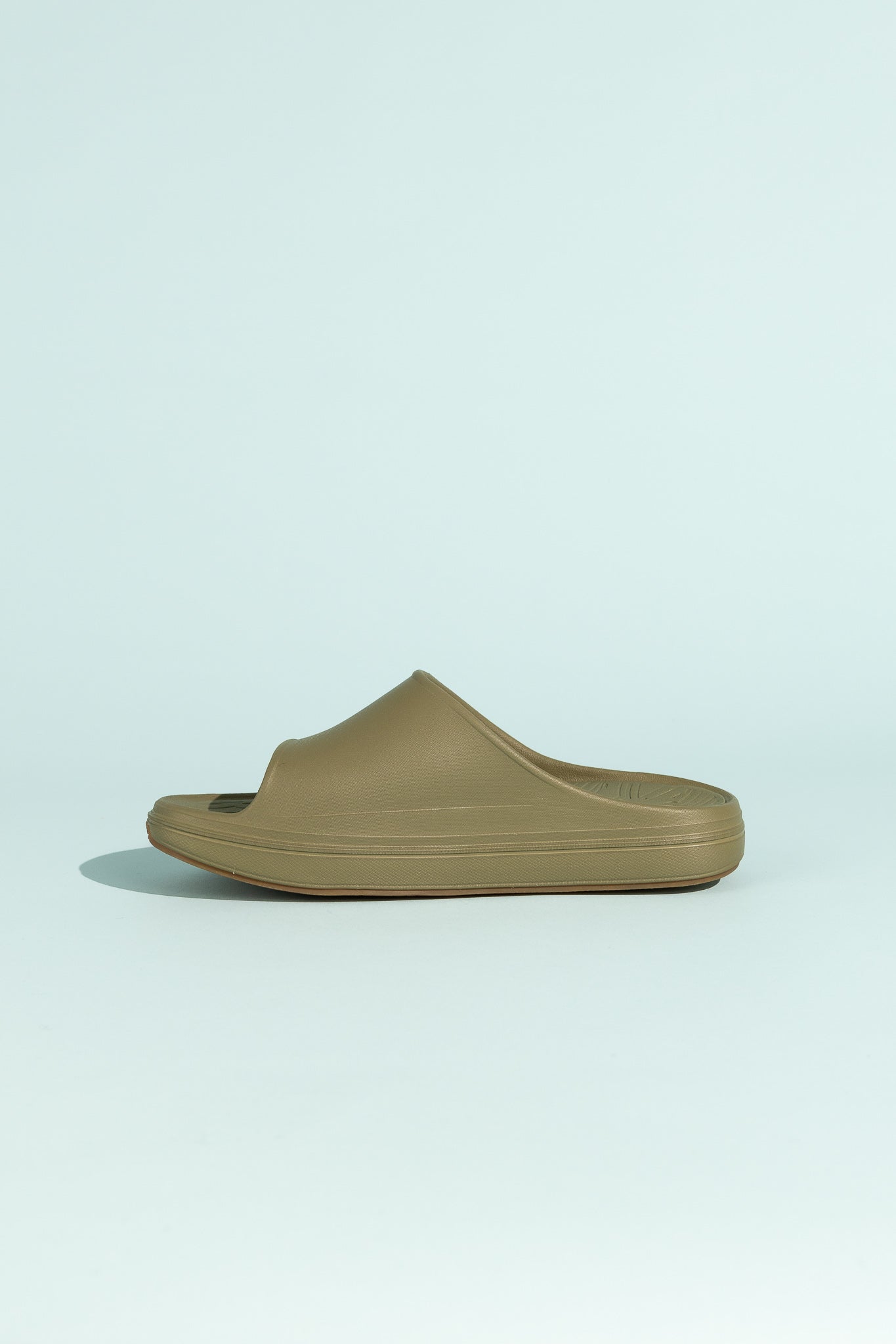 Norda 008 - Sage recovery slide footwear designed for comfort and support after trail running.