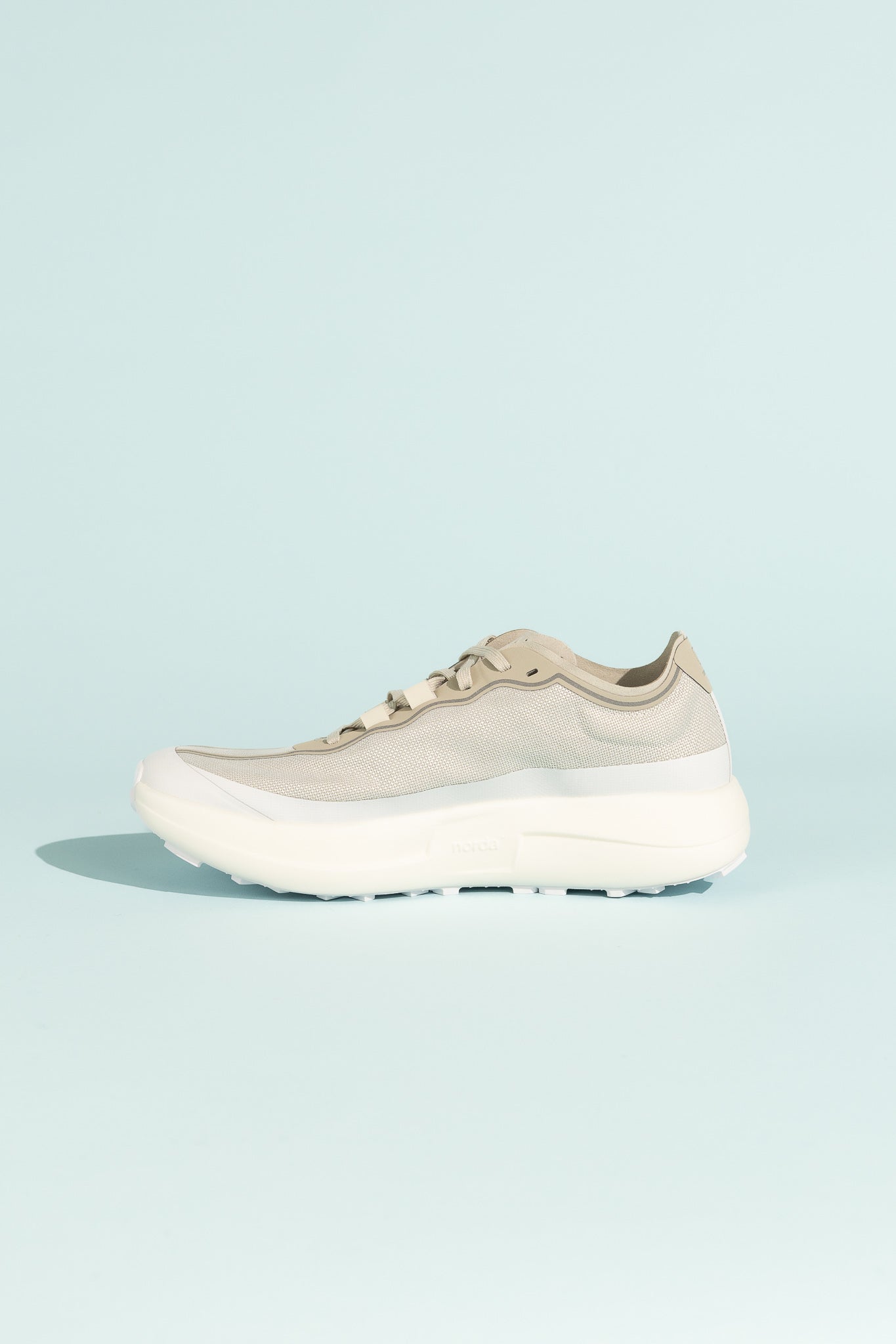 Norda 005 - Névé trail shoe featuring open-mesh Bio-Dyneems® for lightweight, stable performance.