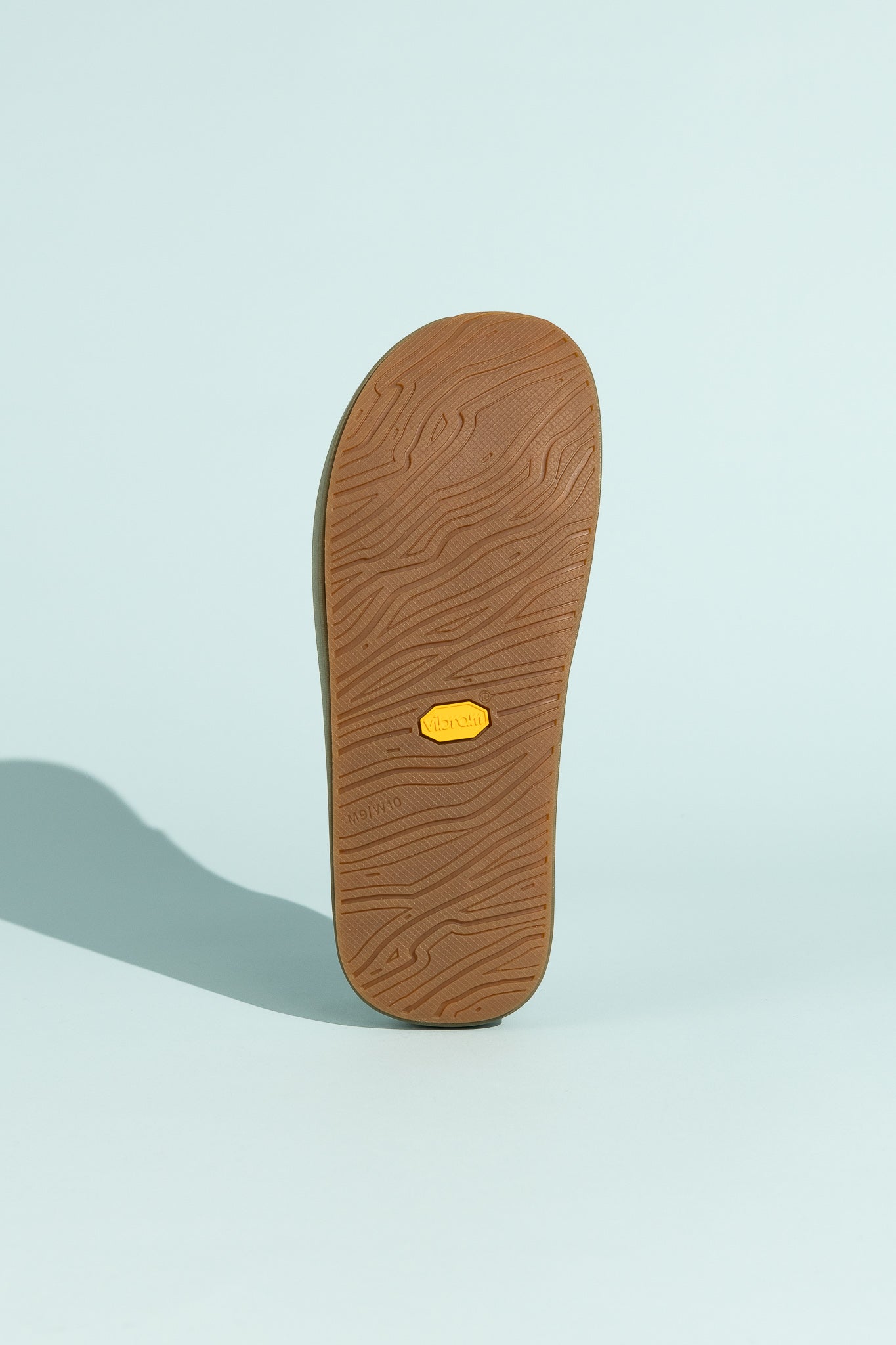 Sole of the Norda 008 - Sage recovery slide, featuring textured grip and durable design.