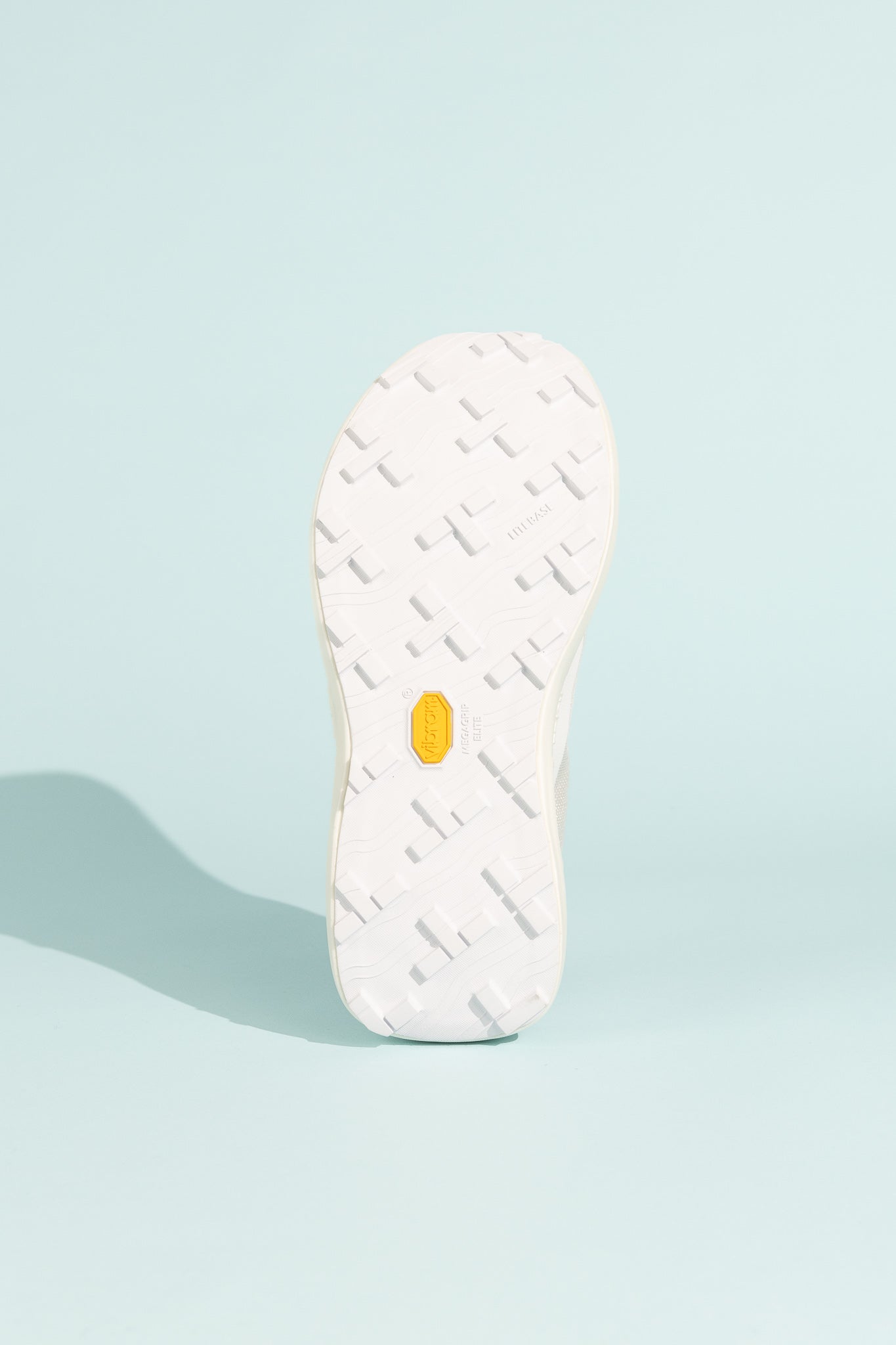 Norda 005 - Névé shoe sole view showcasing traction and lightweight design on a light background.