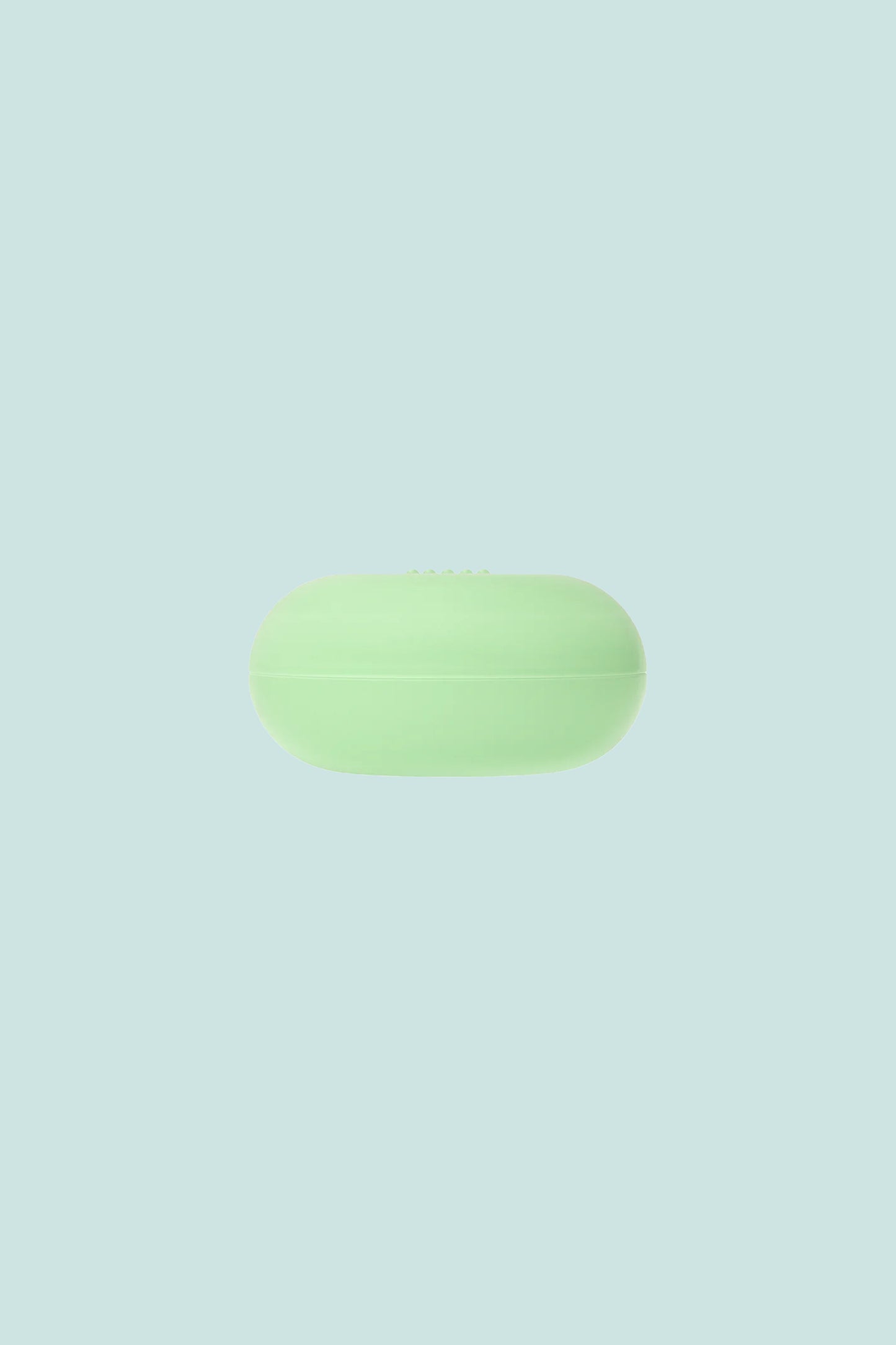 OEM Nourishing Lip Balm in a mint green container with a smooth surface.