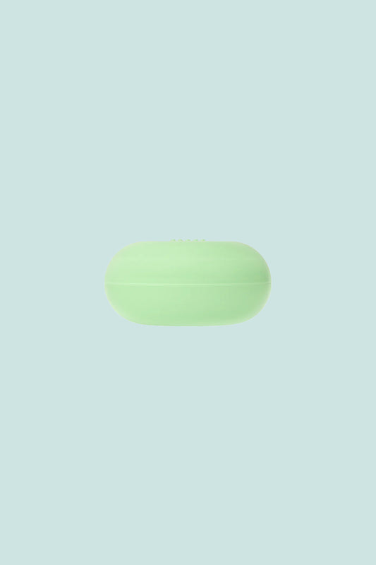 OEM Nourishing Lip Balm in a mint green container with a smooth surface.