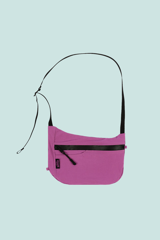 Pa'lante x Bedrock mauve crossbody sidebag with zip pocket and adjustable strap.