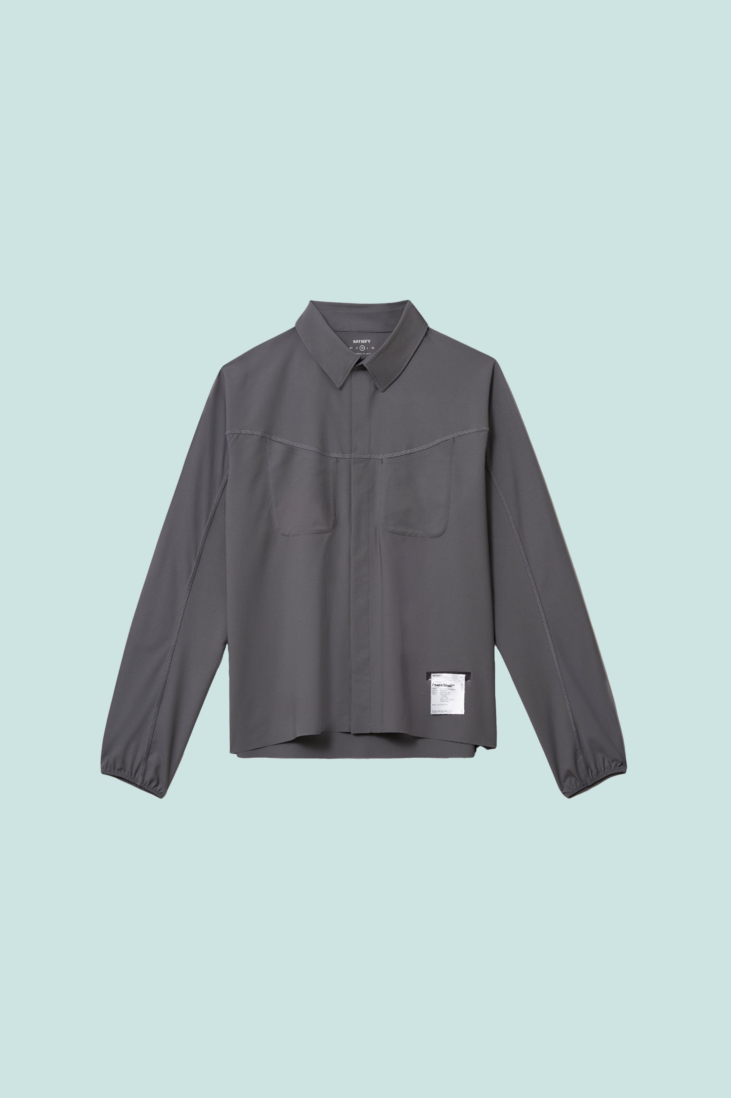 Satisfy PeaceShell™ River Shirt in Lava Smoke color, lightweight, 4-way stretch fabric, ideal for outdoor activities.