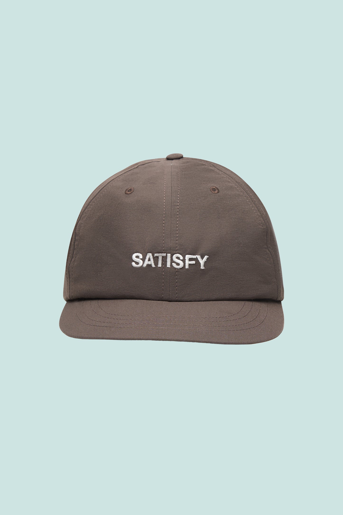 Satisfy PeaceShell™ Running Cap in brown, featuring a stylish design and lightweight, water-repellent fabric.