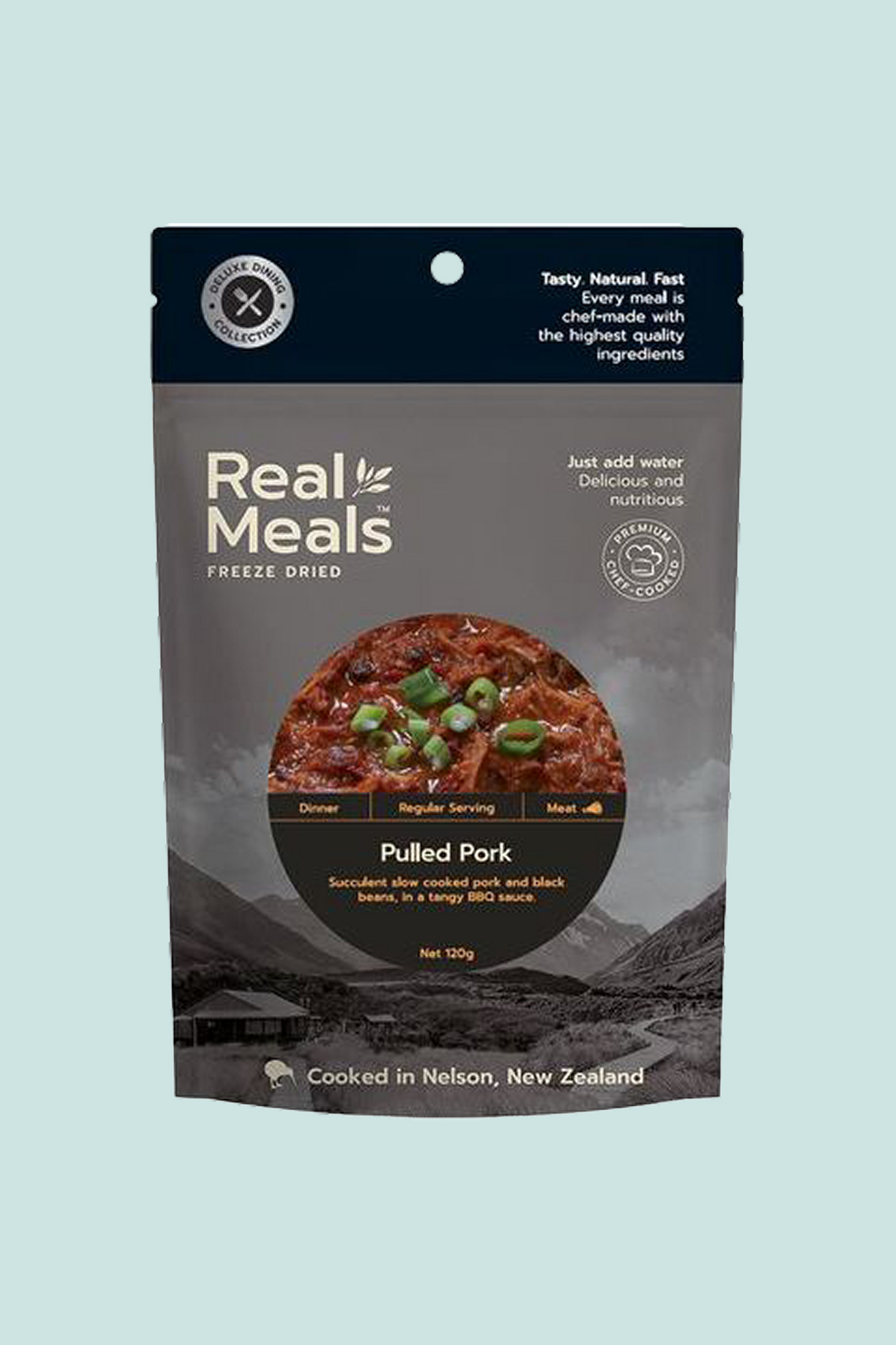 Real Meals Pulled Pork freeze-dried meal package featuring succulent pork and black beans in BBQ sauce.
