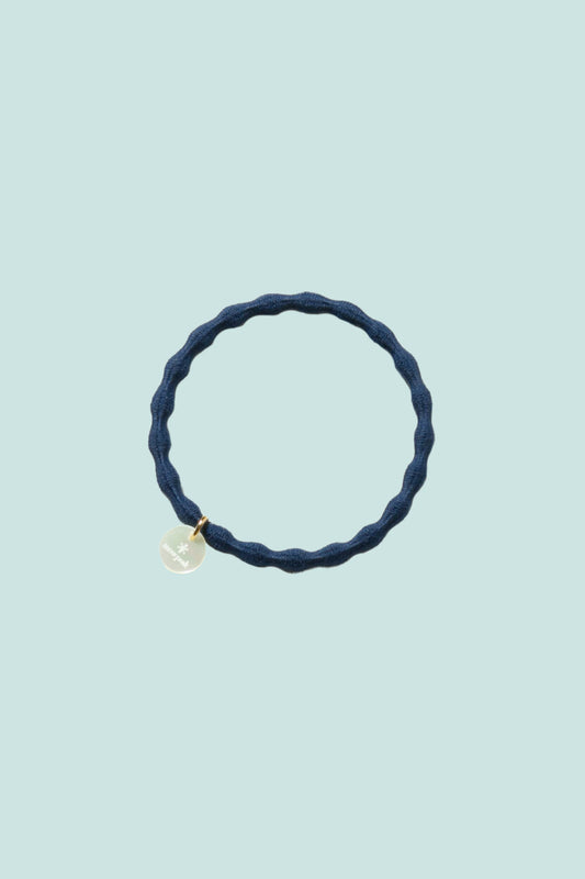 Snow Peak Logo-Charm Hair Tie - Navy, a versatile hair tie and bracelet that reduces hair pulling.
