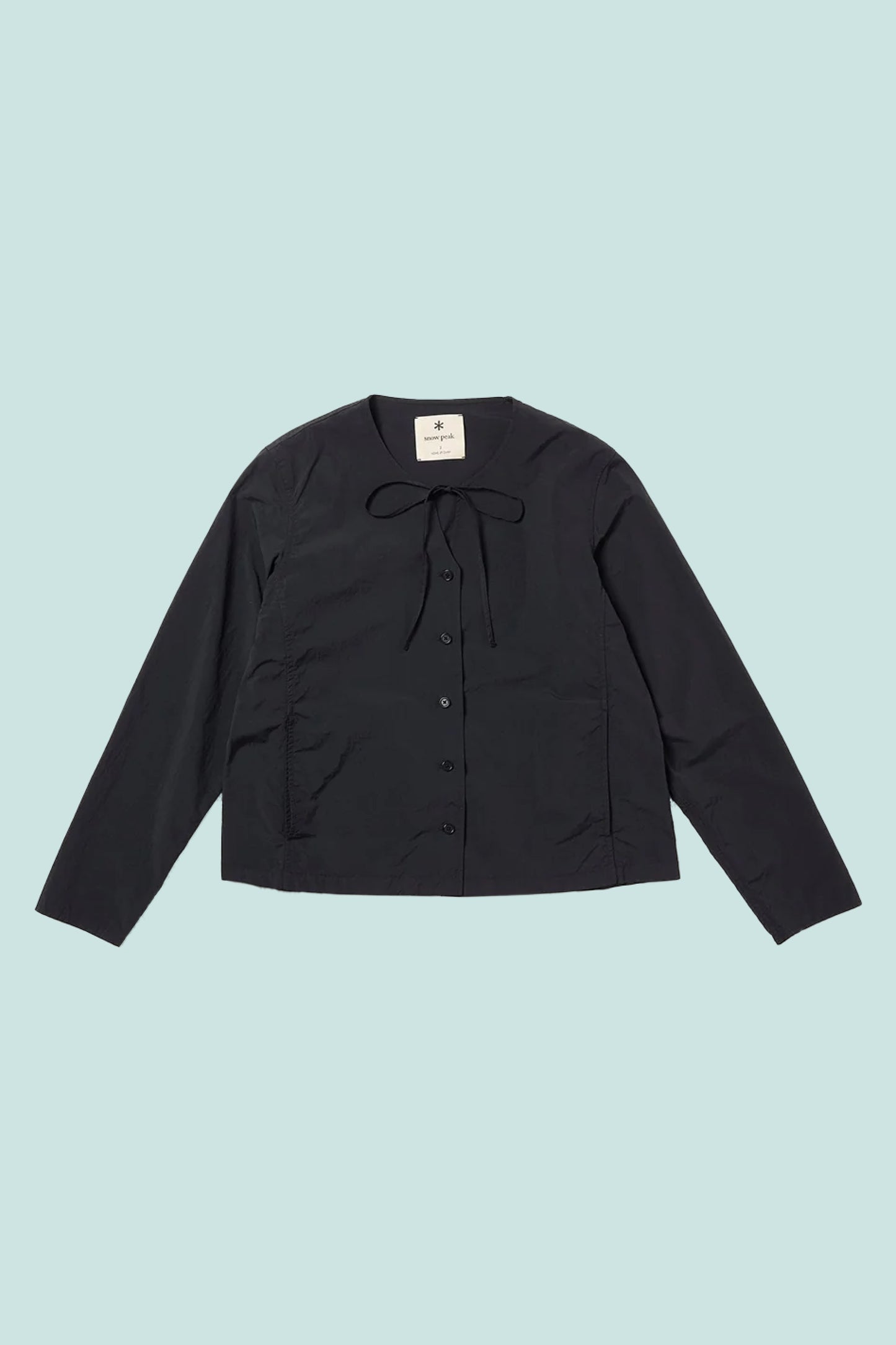 Snow Peak Garment Dyed Blouse in Black, lightweight and water-repellant, perfect for hiking and casual wear.