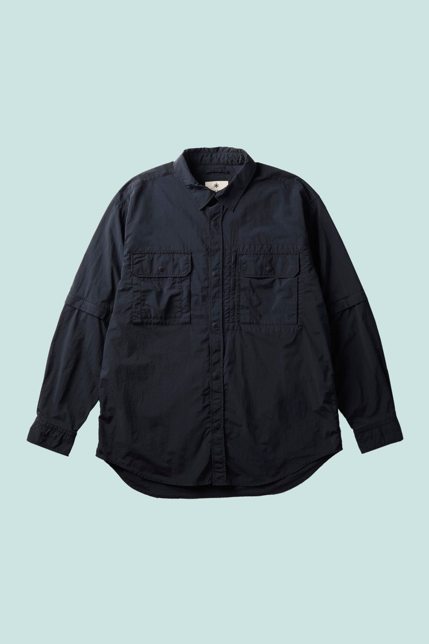 Snow Peak Garment Dyed Convertible Shirt in black, lightweight and water-repellant with two front pockets.