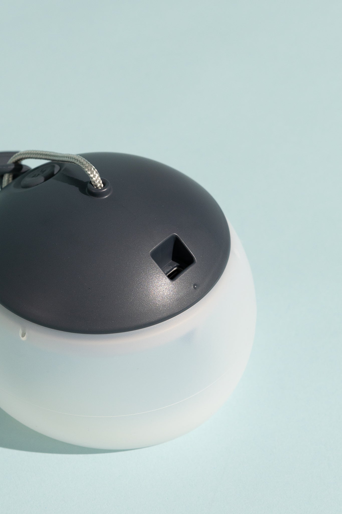 Snow Peak Rechargeable Hozuki Lantern - Night Sky on a light blue background.
