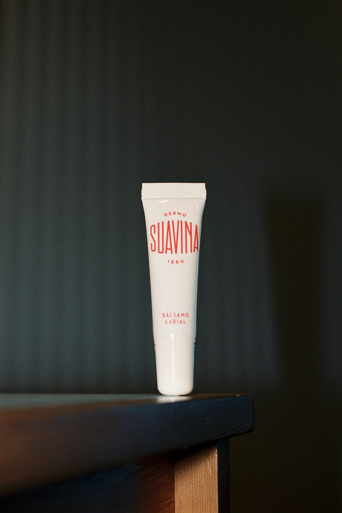 Original Lip Balm in a 10ml tube, featuring natural essential oils for dry lips, sold in stylish packaging.