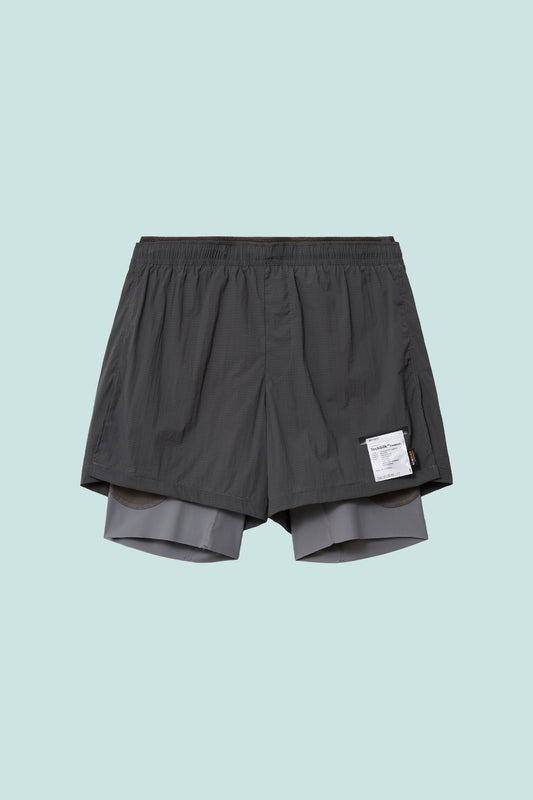 Satisfy TechSilk™ Cordura® 8" shorts in grey stone, featuring lightweight design and multiple pockets for trail running.