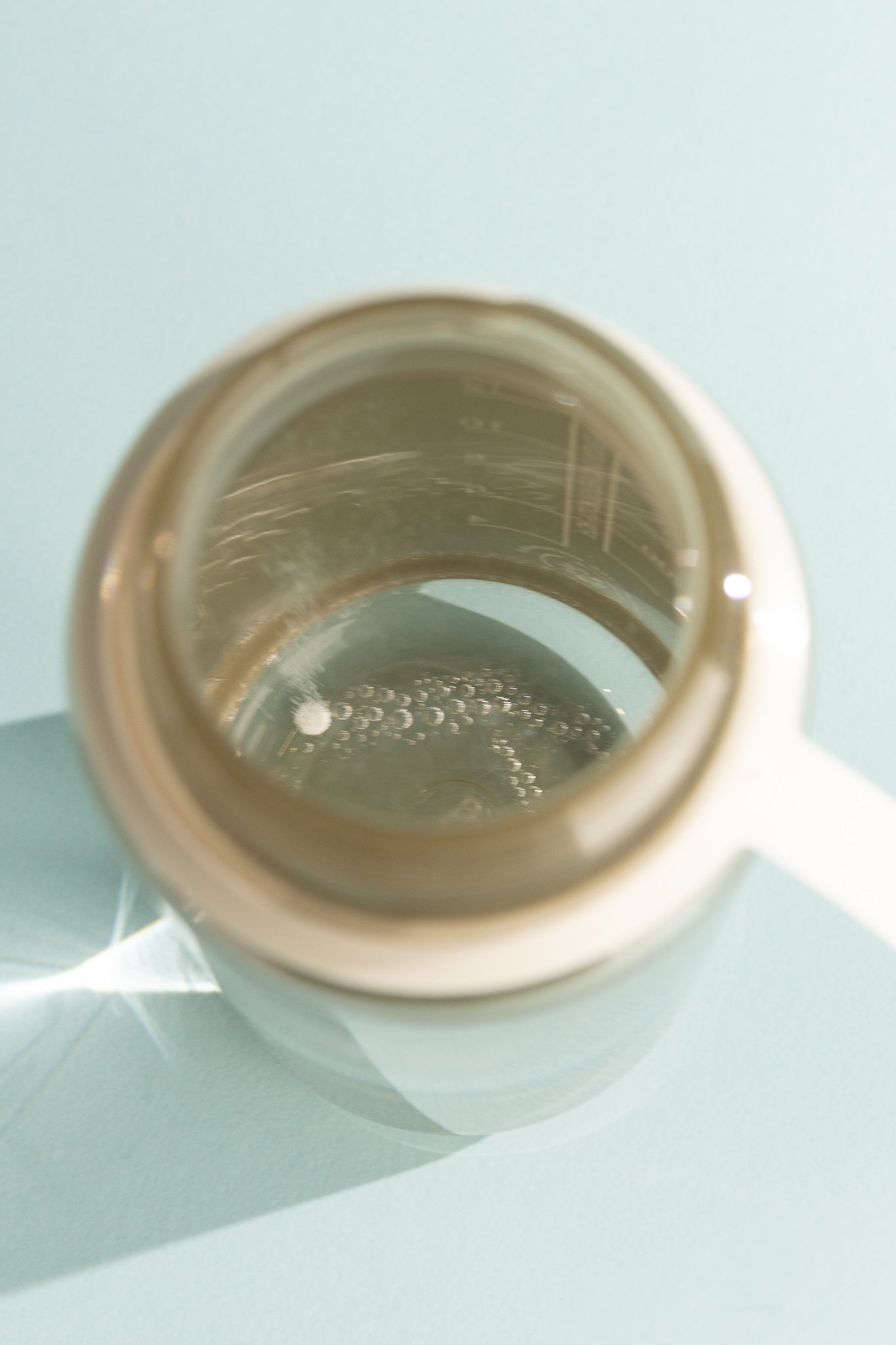 Aquatabs Purification Tablets dissolving in a clear water jug, promoting safe drinking water options.