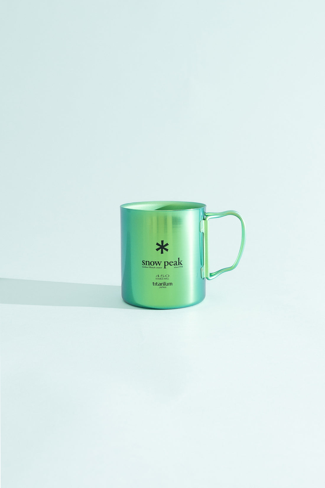 Snow Peak Titanium Double Wall Cup 450 in Green, view 1.