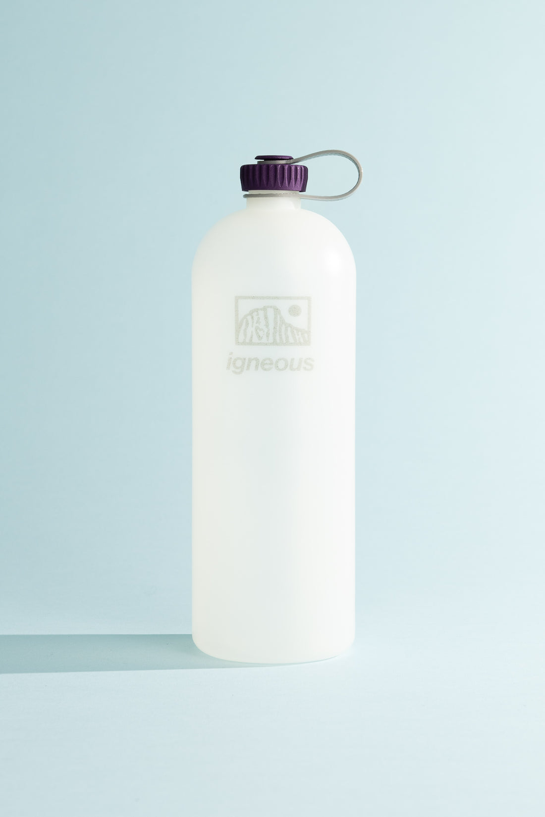 Igneous Gear NOBO Bottle in clear with purple cap, designed for ultralight hiking and daily use.