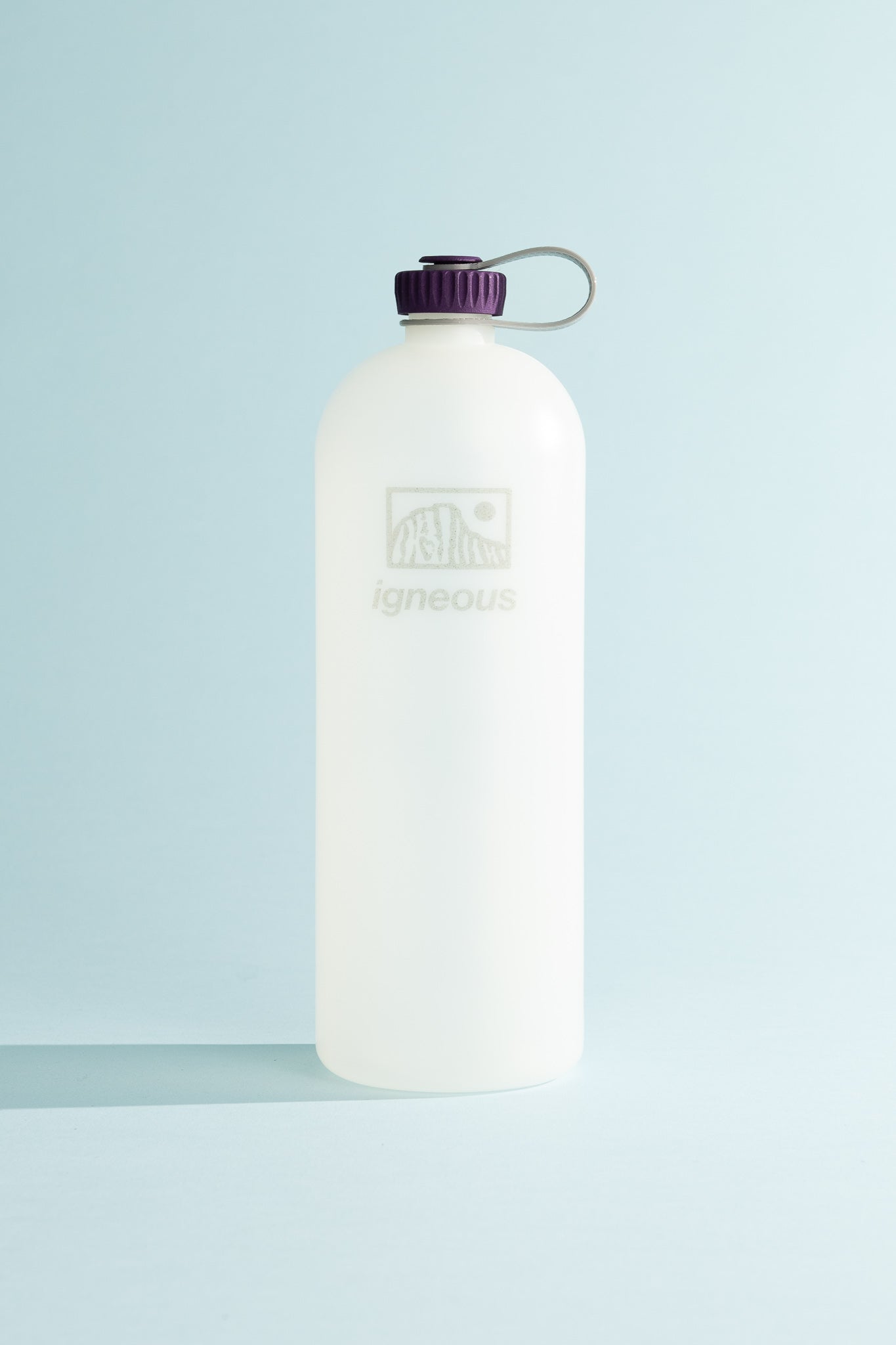 Igneous Gear NOBO Bottle in clear with purple cap, designed for ultralight hiking and daily use.
