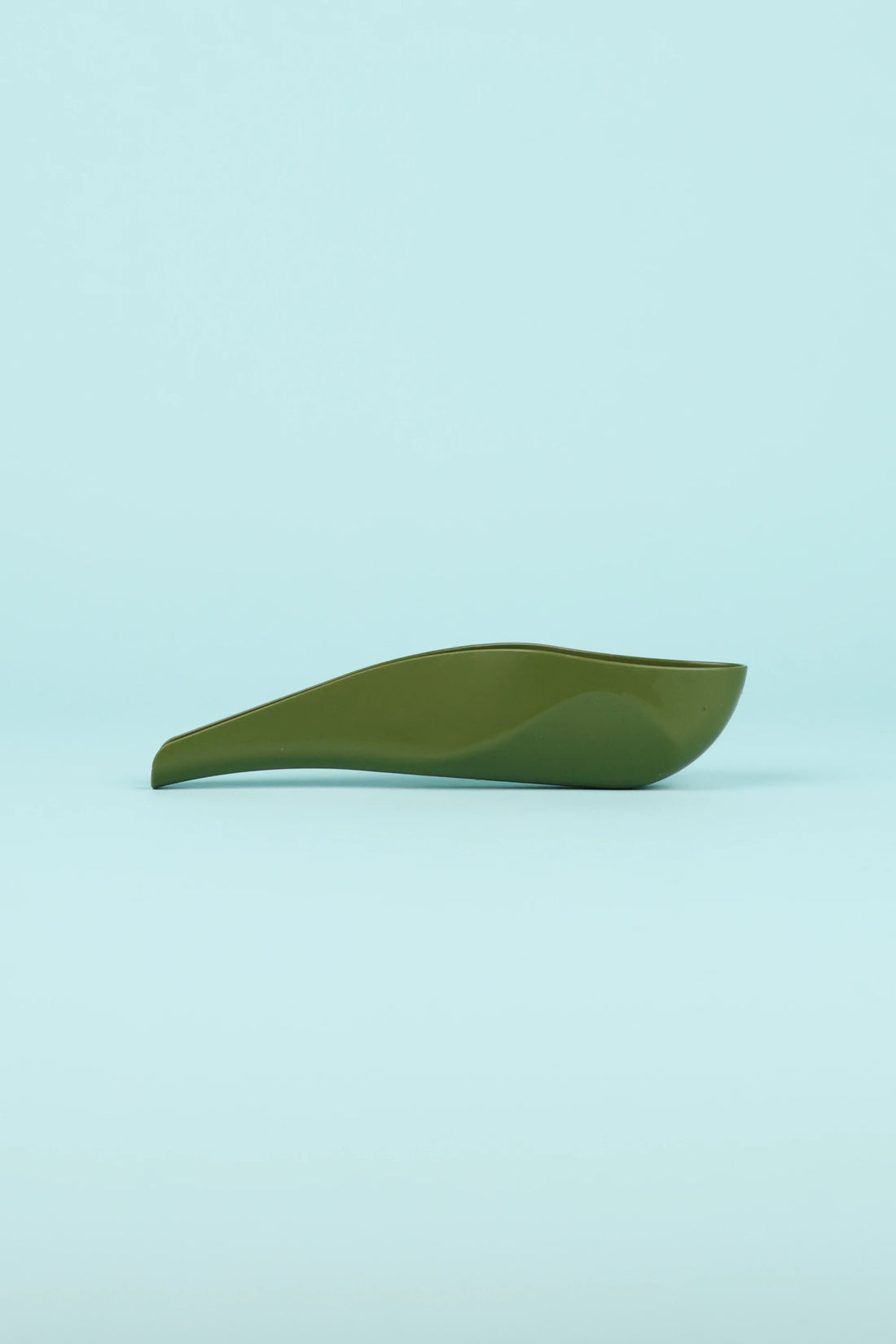 pStyle - Olive, a green plastic device for women and non-binary folks to pee standing up without undressing.