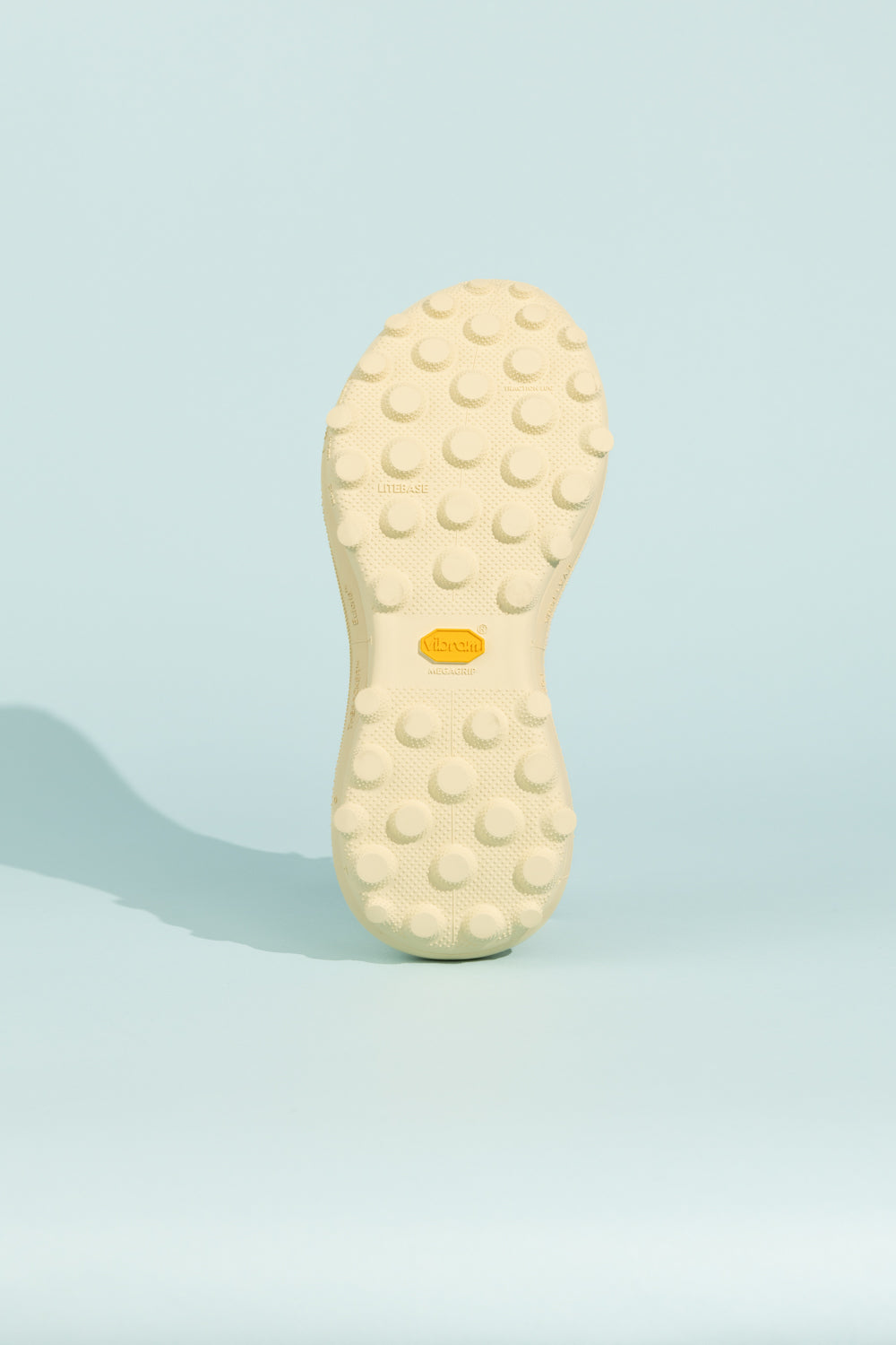 Satisfy TheROCKER - Antique White shoe sole with textured pattern for traction on various terrains.