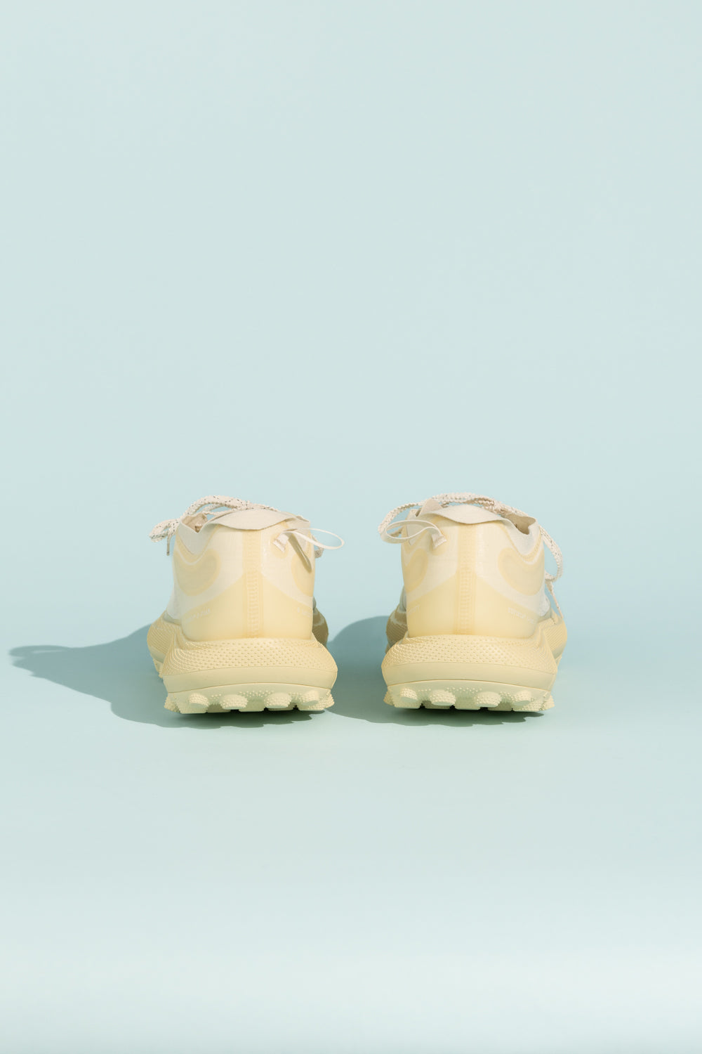 Satisfy TheROCKER - Antique White shoes, showcasing the rear view with a light yellow hue.