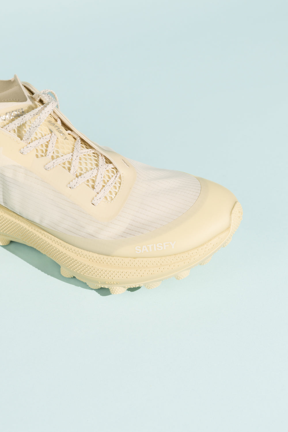 Satisfy TheROCKER - Antique White close-up view showing the shoe's design and detailing.