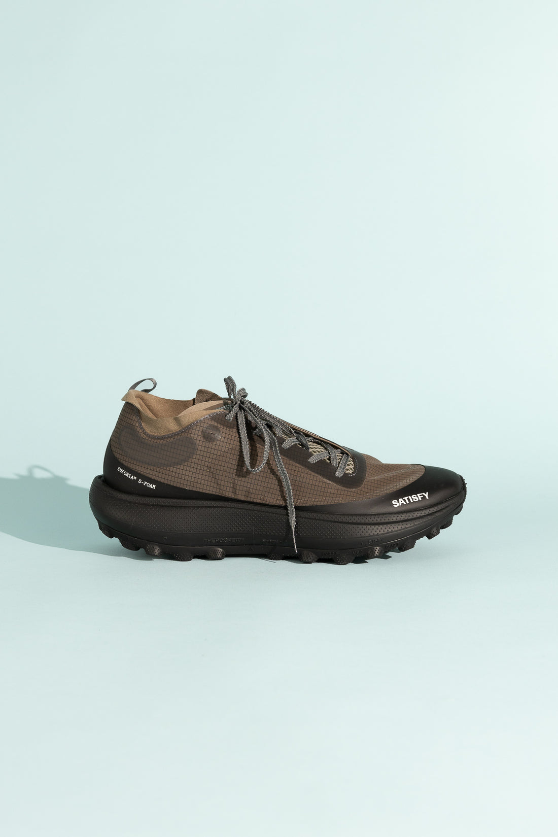 Satisfy TheROCKER - Falcon shoe designed for ultra distance running across various terrains.