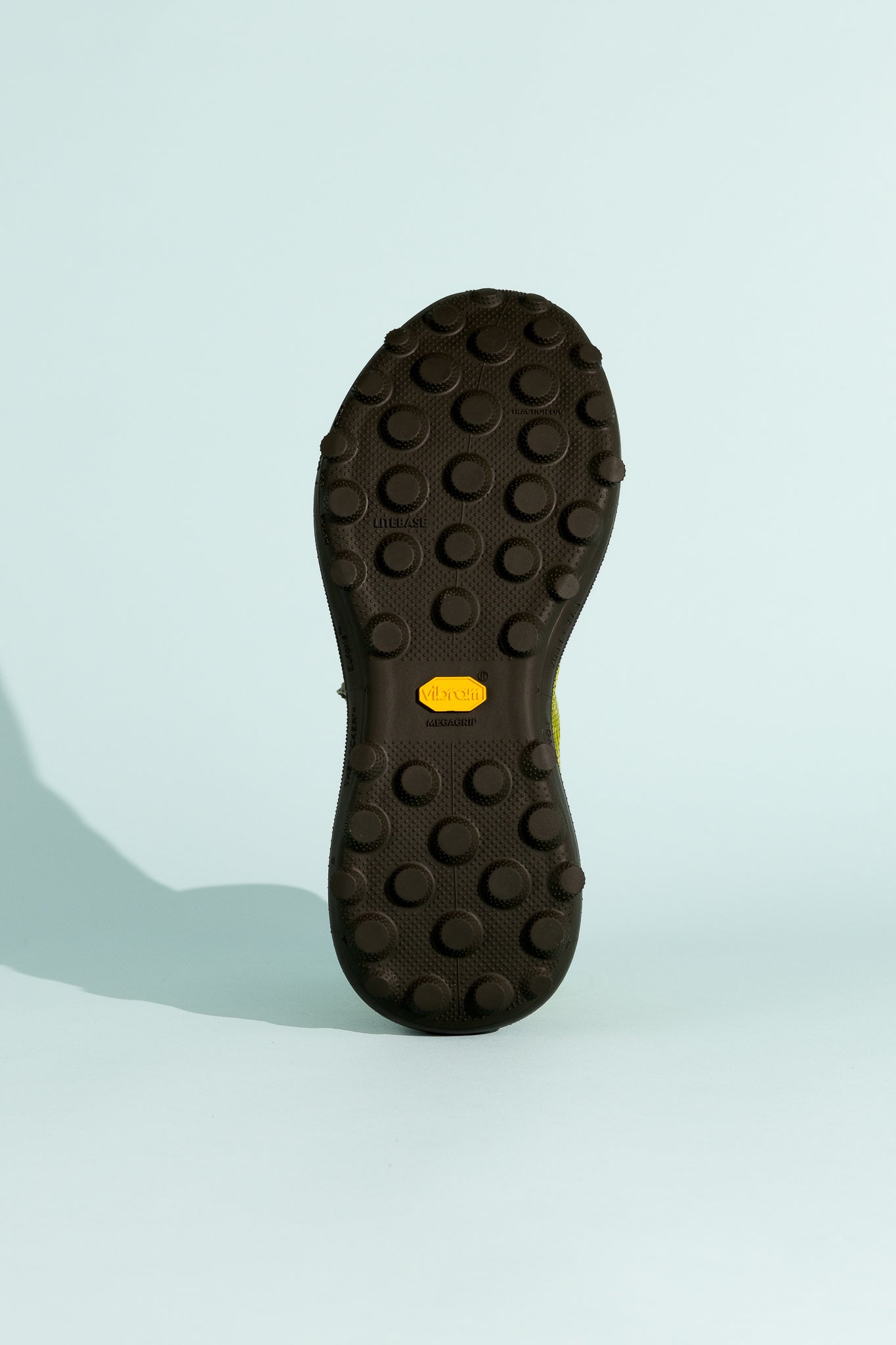 Satisfy TheROCKER shoe outsole featuring TuneLug technology for improved traction and performance.