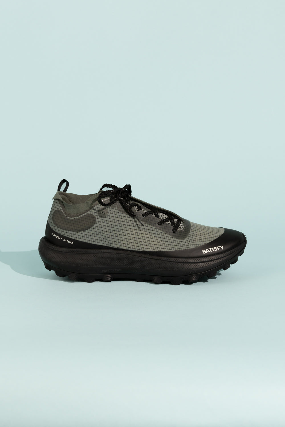 Satisfy TheROCKER - Shadow side view showcasing its design and traction for ultra distance performance.