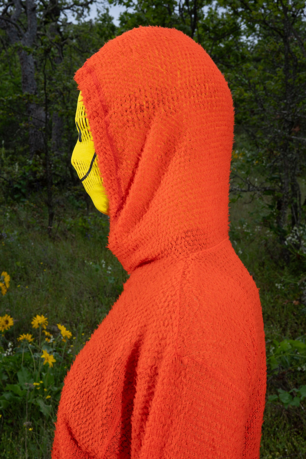 Shag Hoodie v2.0 in Tangerine Tango, hood worn outdoors