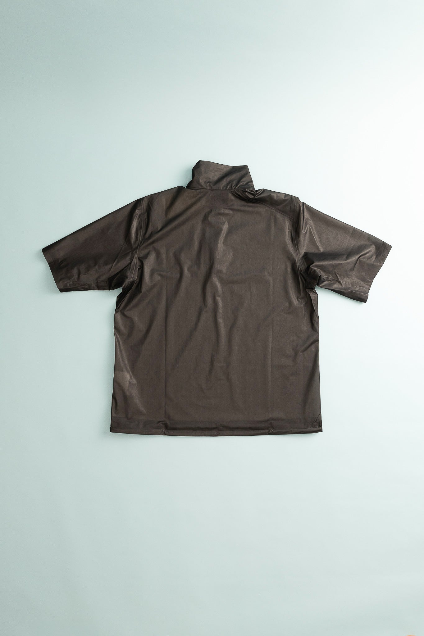 Womens The Orange Tee in True Black, lightweight ultralight shell for trail running and weather protection.