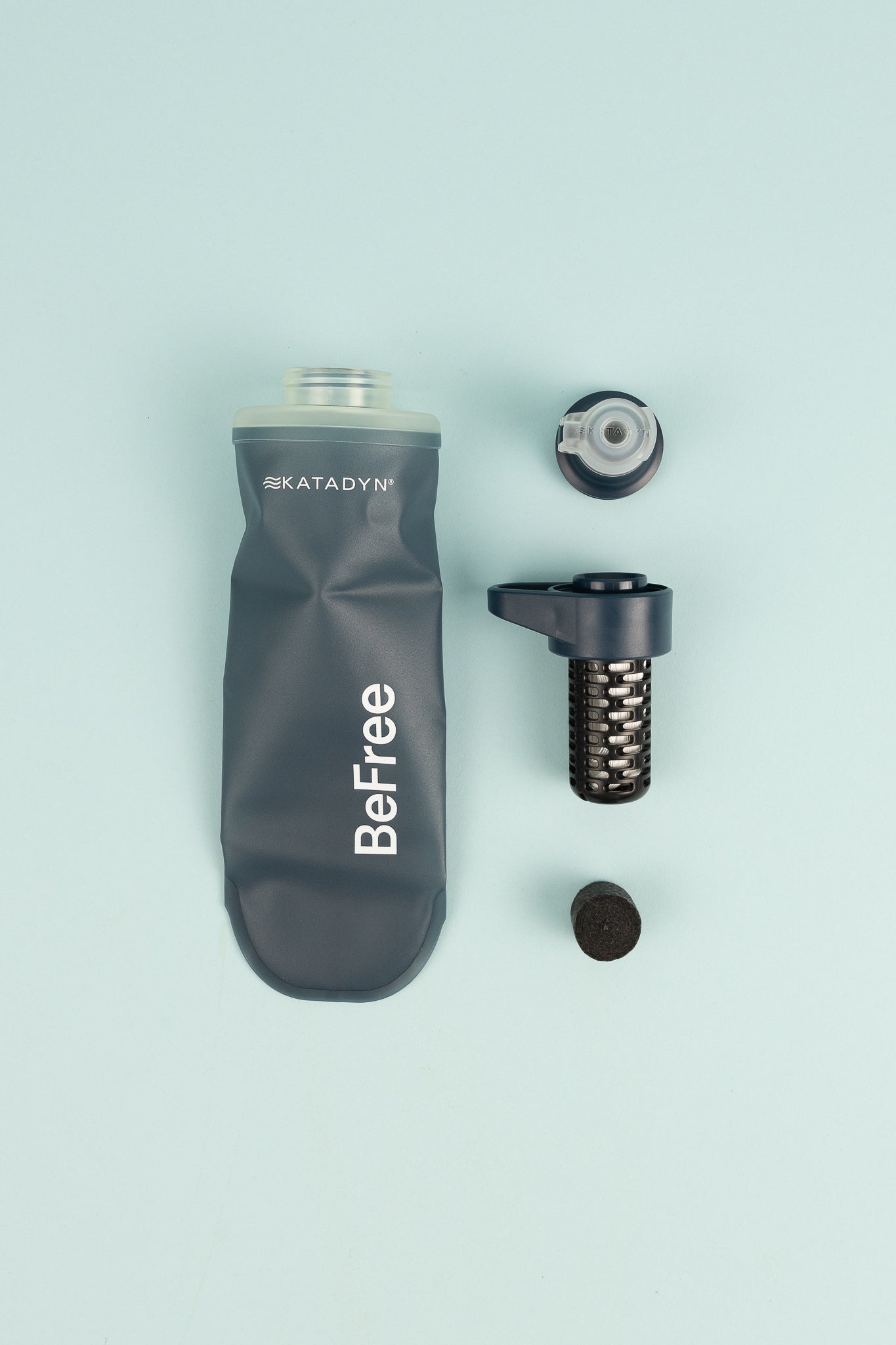 Katadyn BeFree Filter AC Bottle 0.5L in slate blue with filter components and lid on light background.