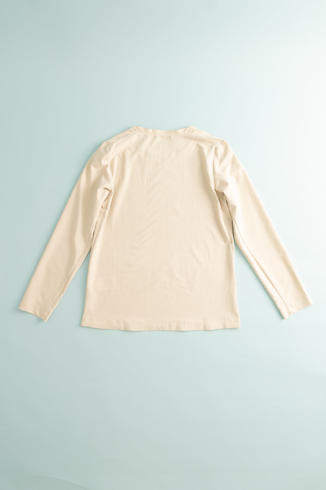 Womens Cover Crew Top - Foggy Mountain, back view of lightweight long sleeve top in beige color.