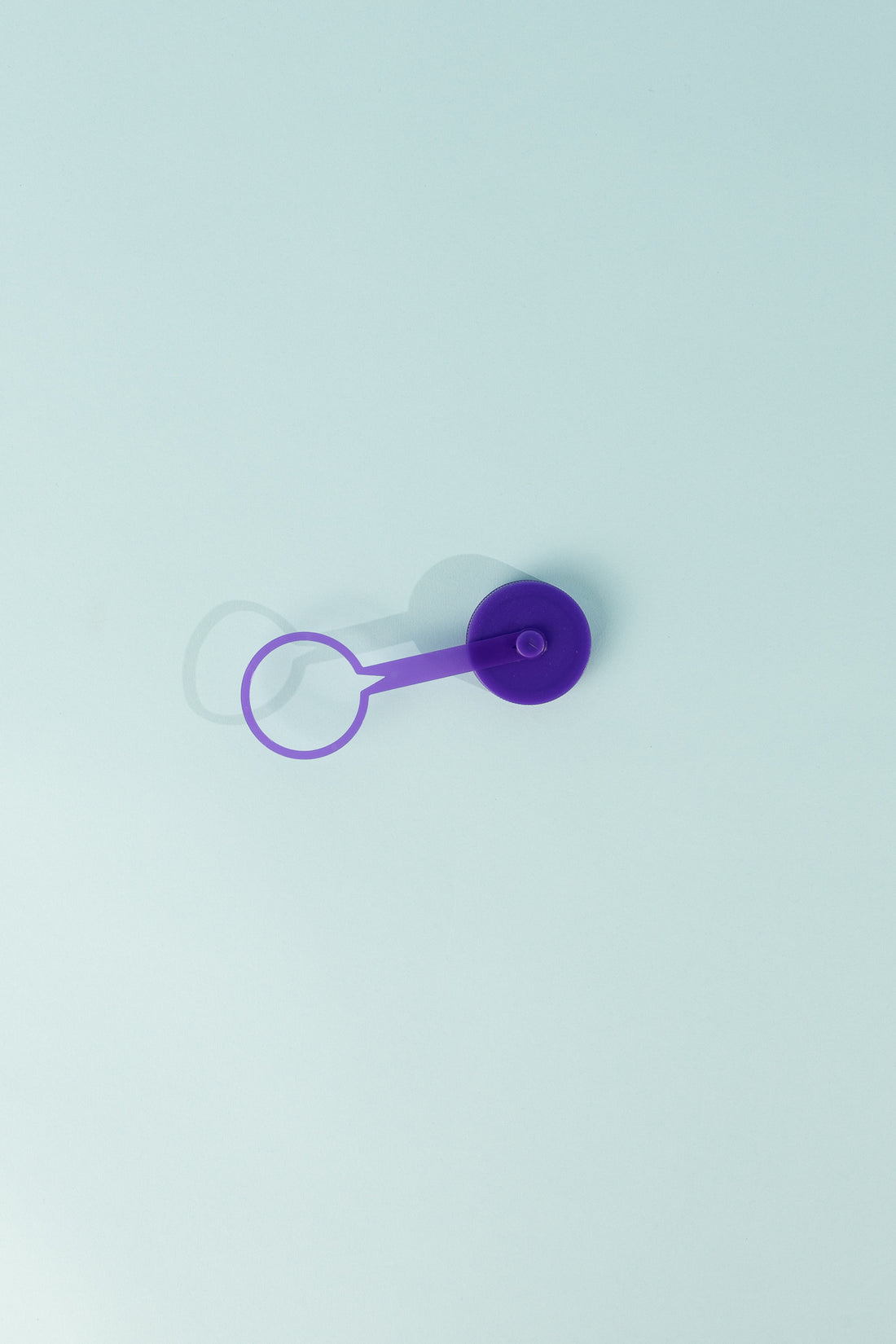 Replacement Tethered Cap for 42mm threaded neck in purple color.