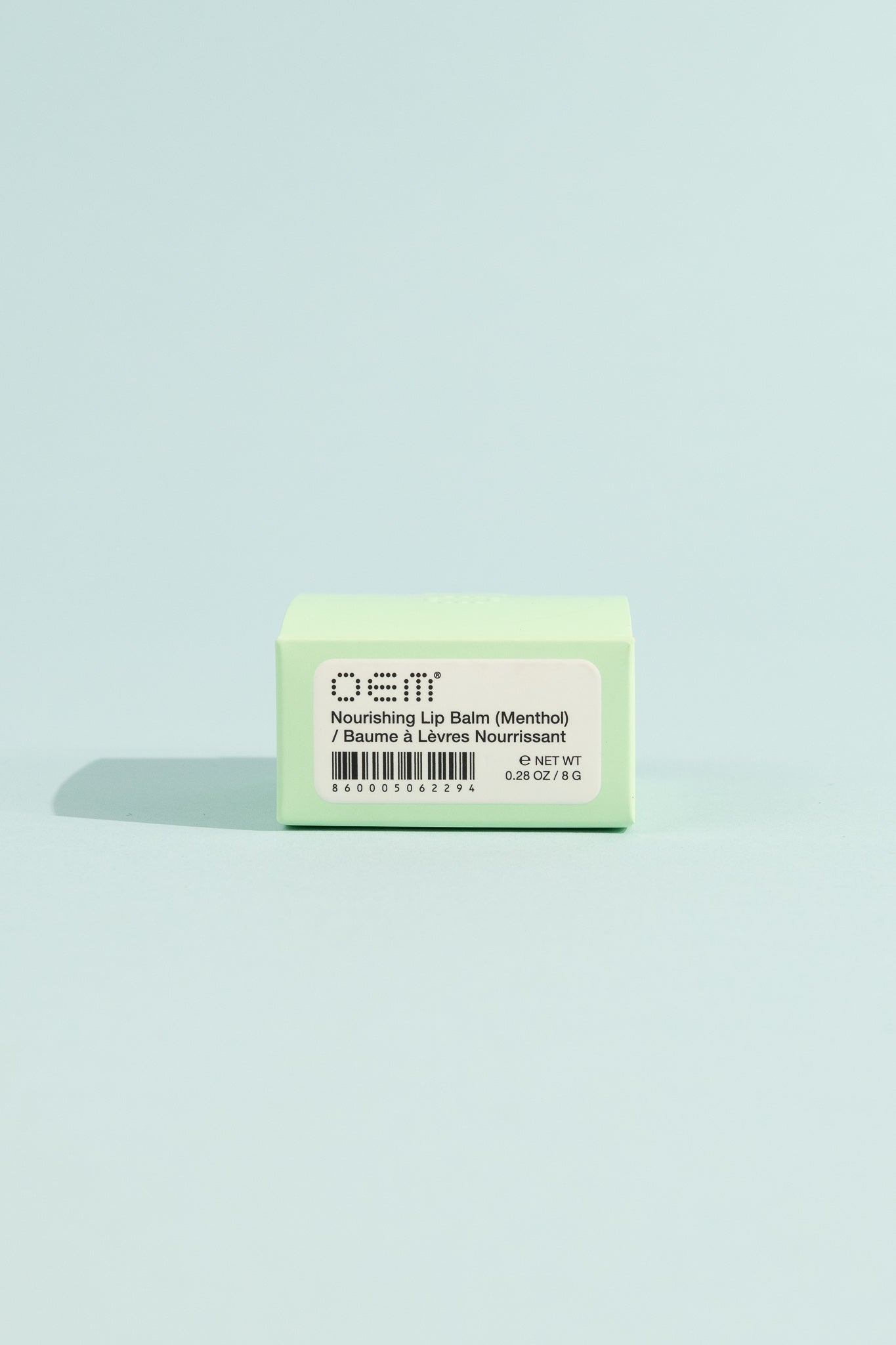 OEM Nourishing Lip Balm - Menthol packaging with soothing benefits for dry lips.