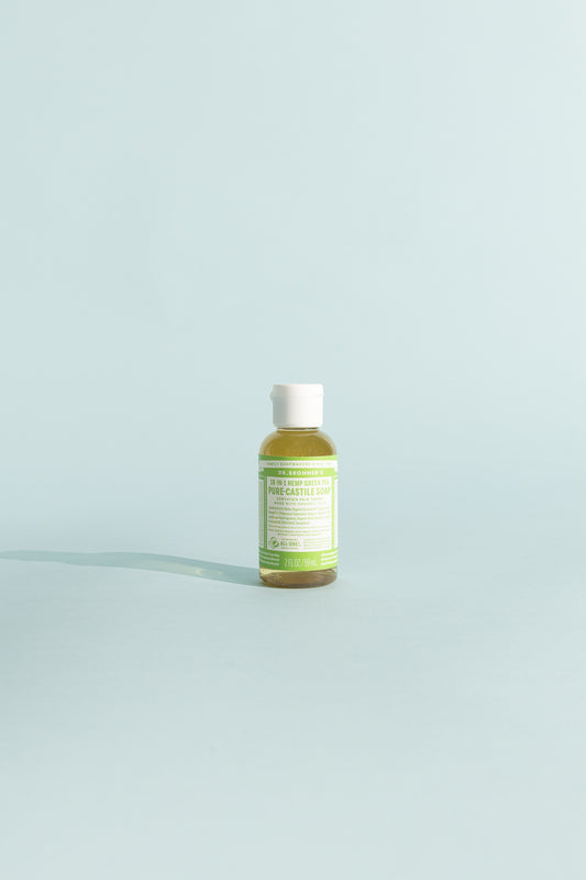 Green Tea Pure-Castile Liquid Soap - 59ml bottle on a soft blue background.