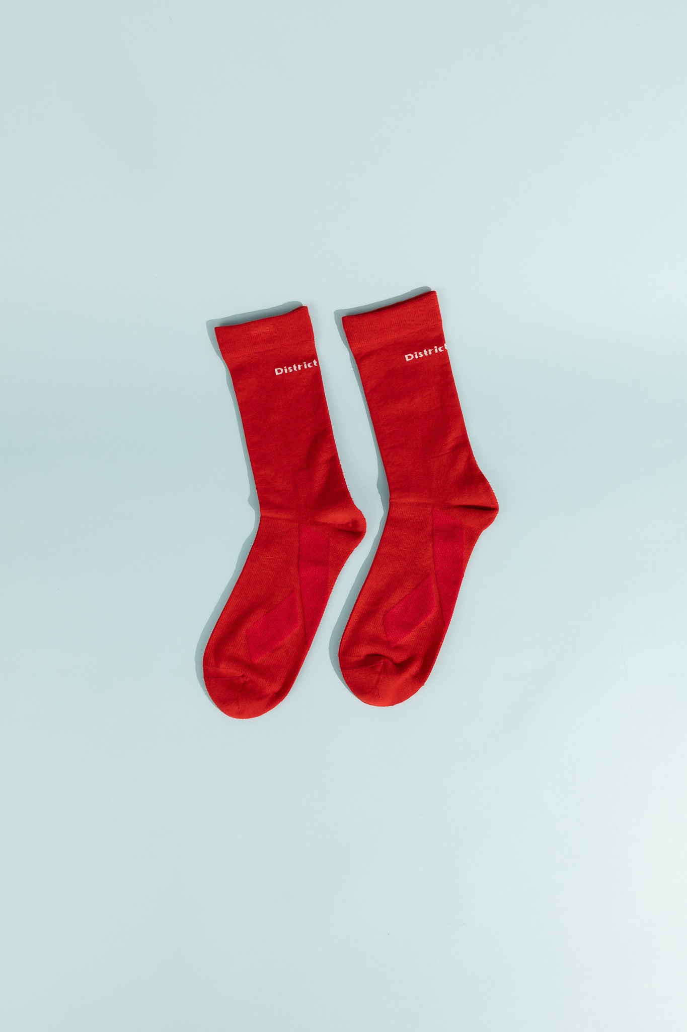 Cordura® Socks in Sport Red color, featuring a snug fit for comfort during activities like running and hiking.