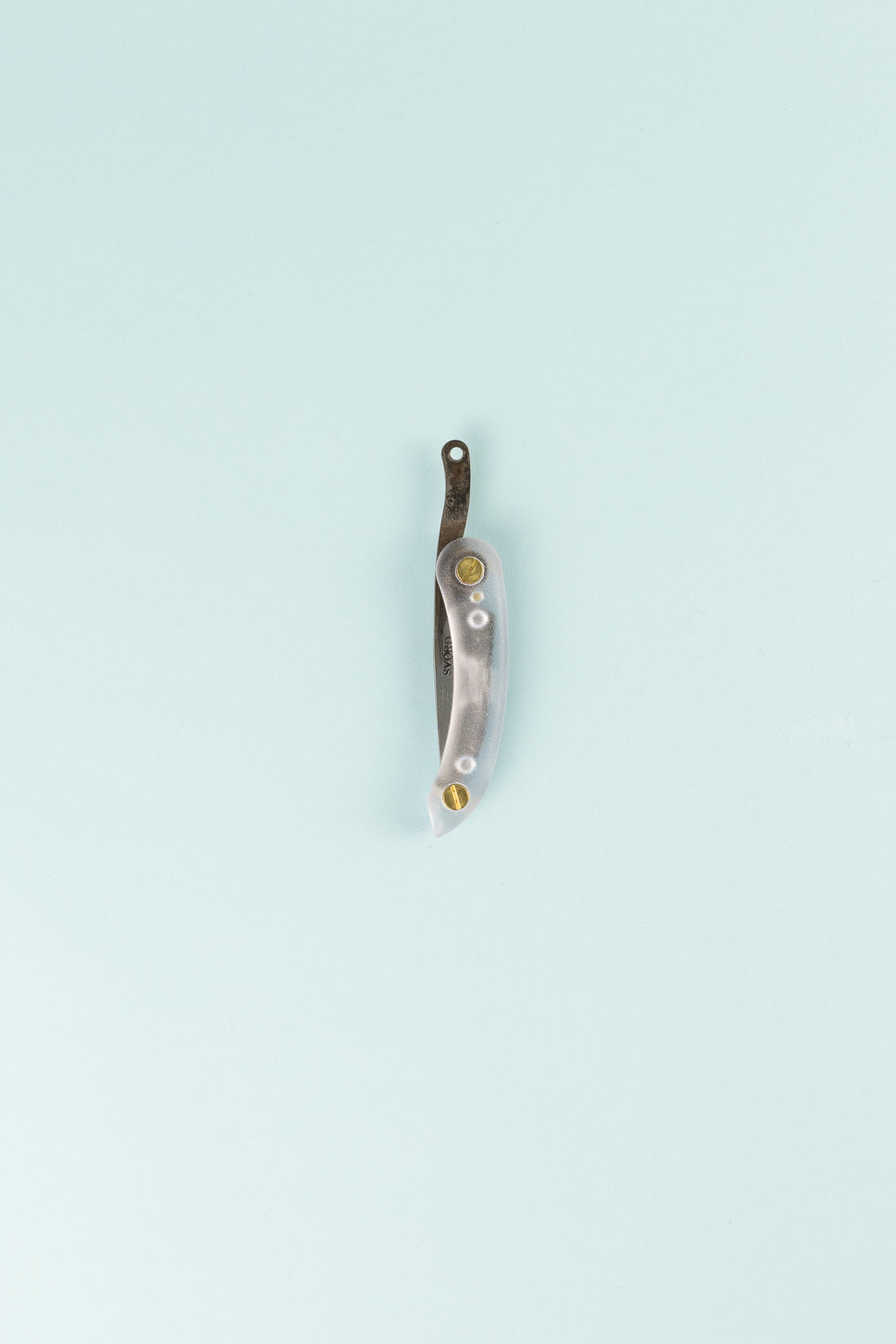 Stainless Peasant Knife Mini showcasing its handcrafted stainless steel blade and unique handle design.
