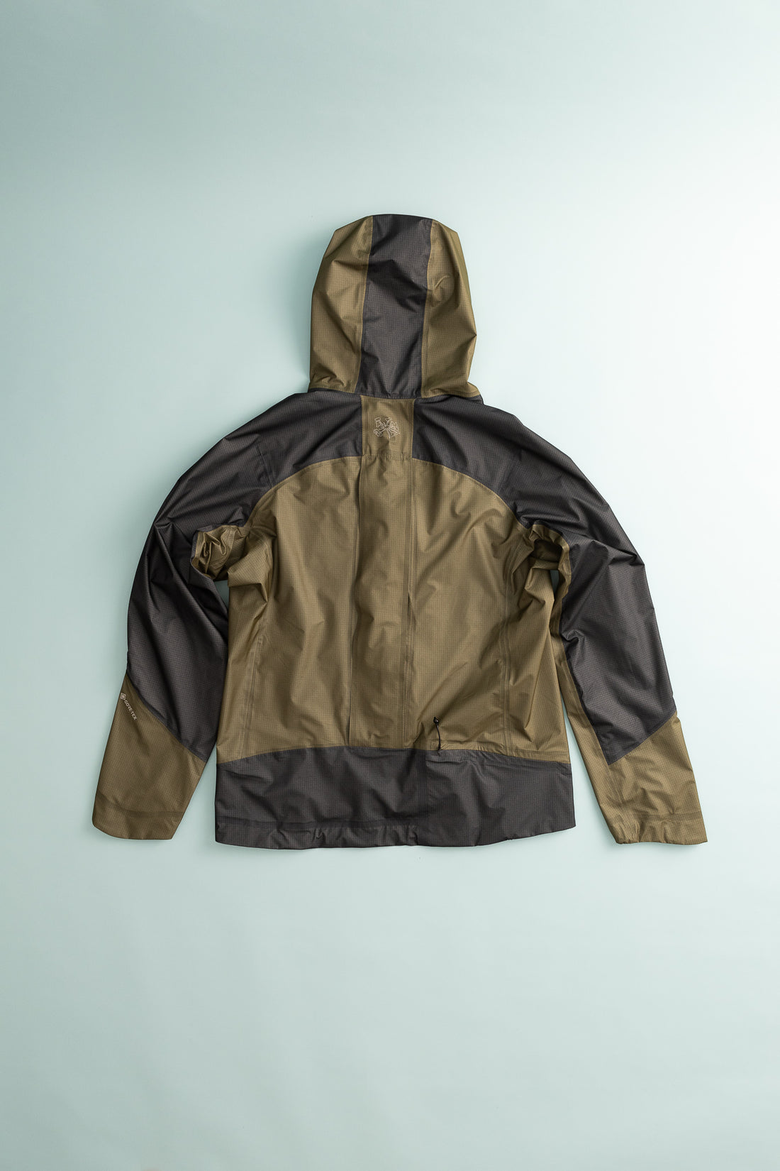 Back view of the Sphere LT GORE-TEX Jacket in Dark Olive color, showcasing its lightweight design and ergonomic fit.