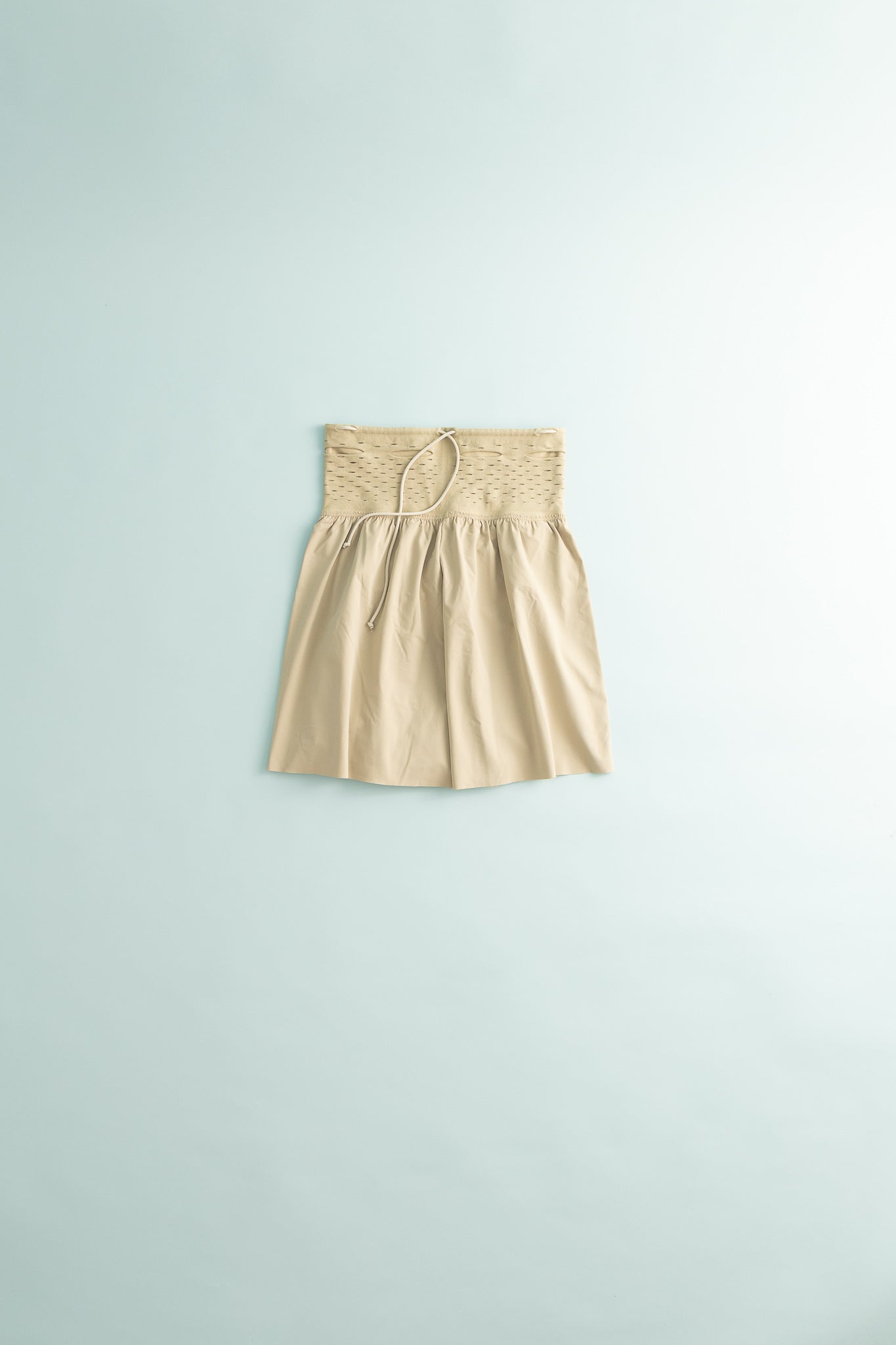 Gnuhr Warp Short Short in plaza taupe color, featuring a unique waistband with integrated pockets.