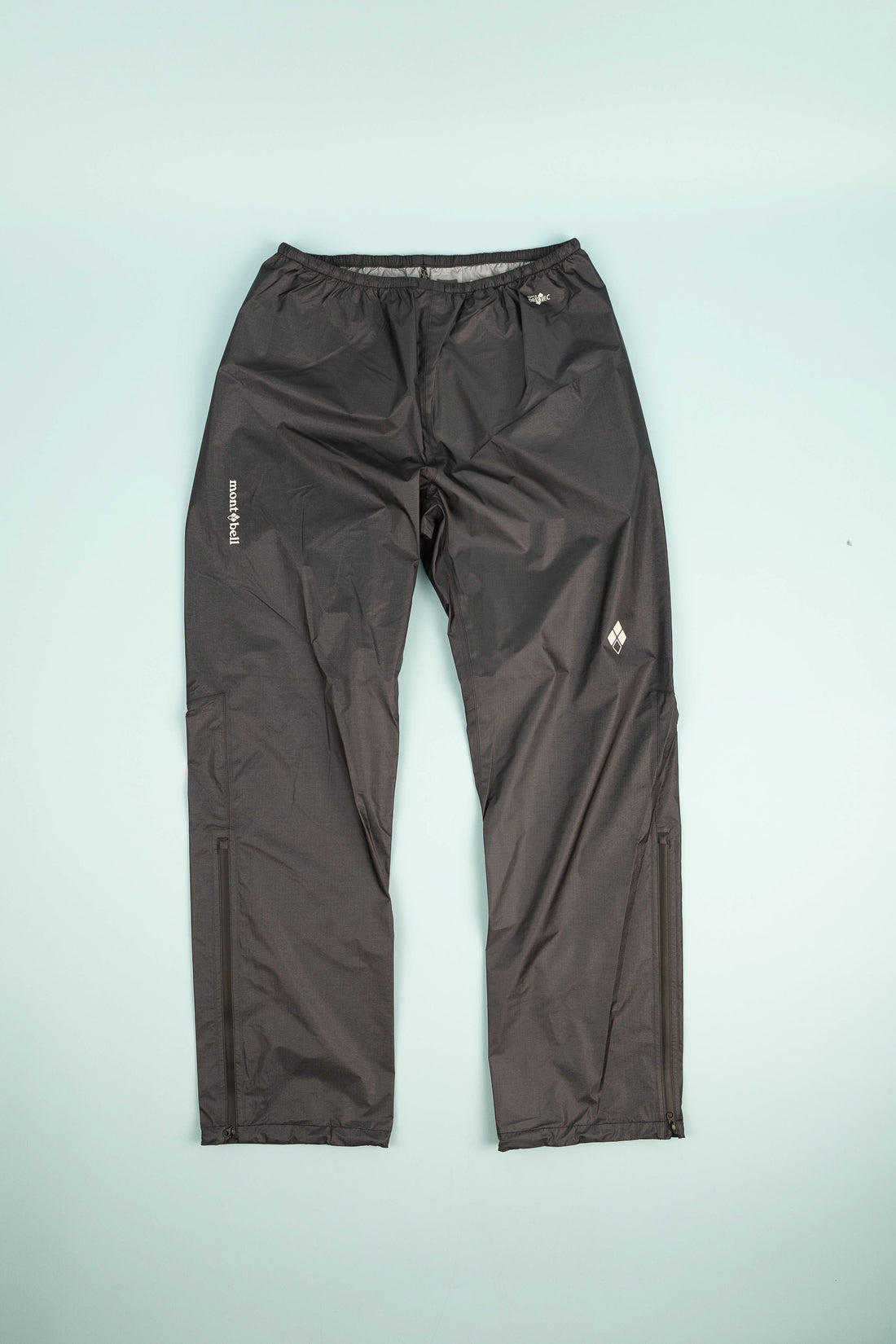 Montbell US Men's Dry-Tec U.L. Rain Pants in black, designed for ultralight rain protection.