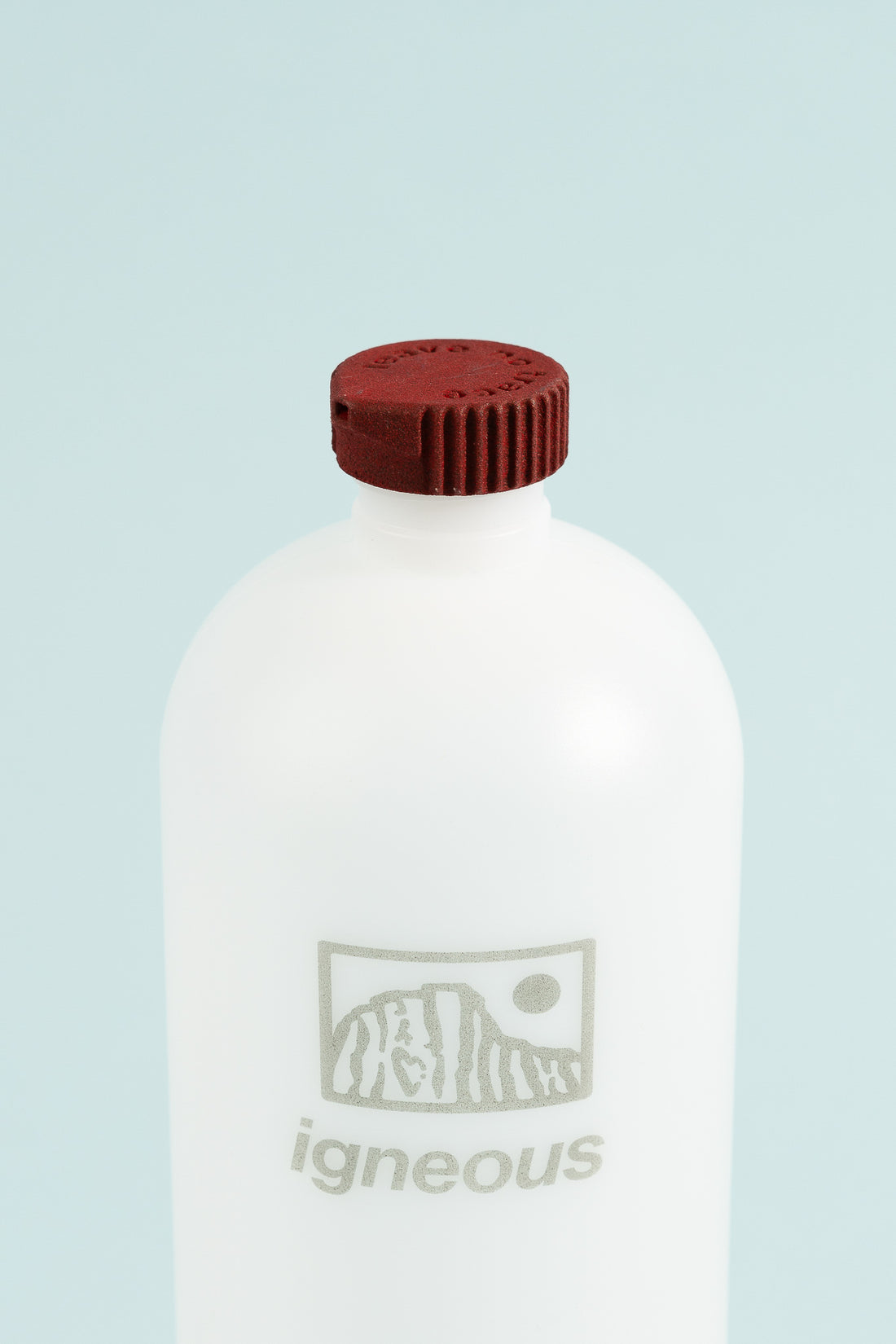 Bottle Cap Bidet attachment on an Igneous water bottle for a hygienic outdoor experience.