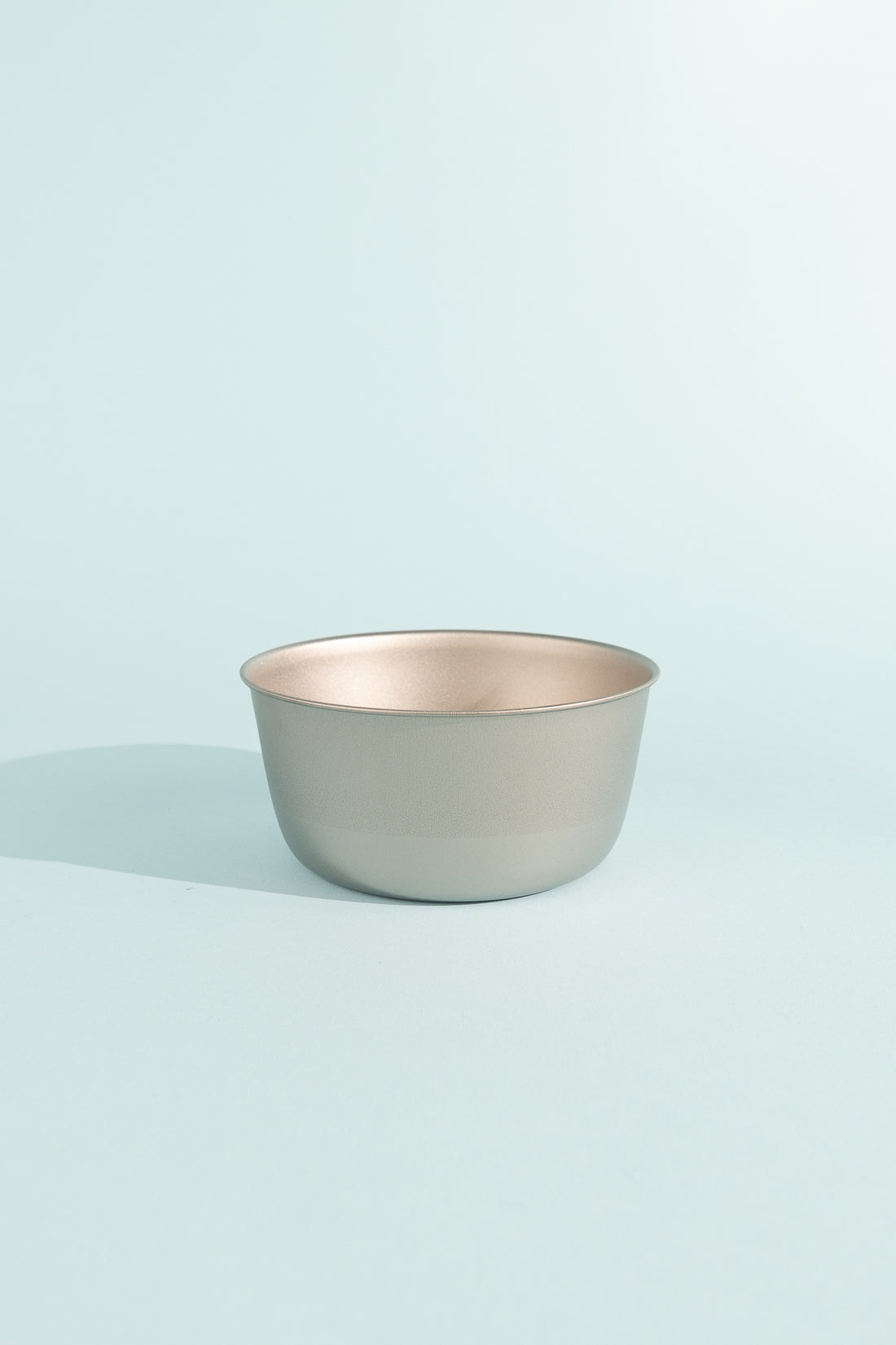 A sleek Titanium Trek Bowl on a minimal background, perfect for outdoor dining and home decor.