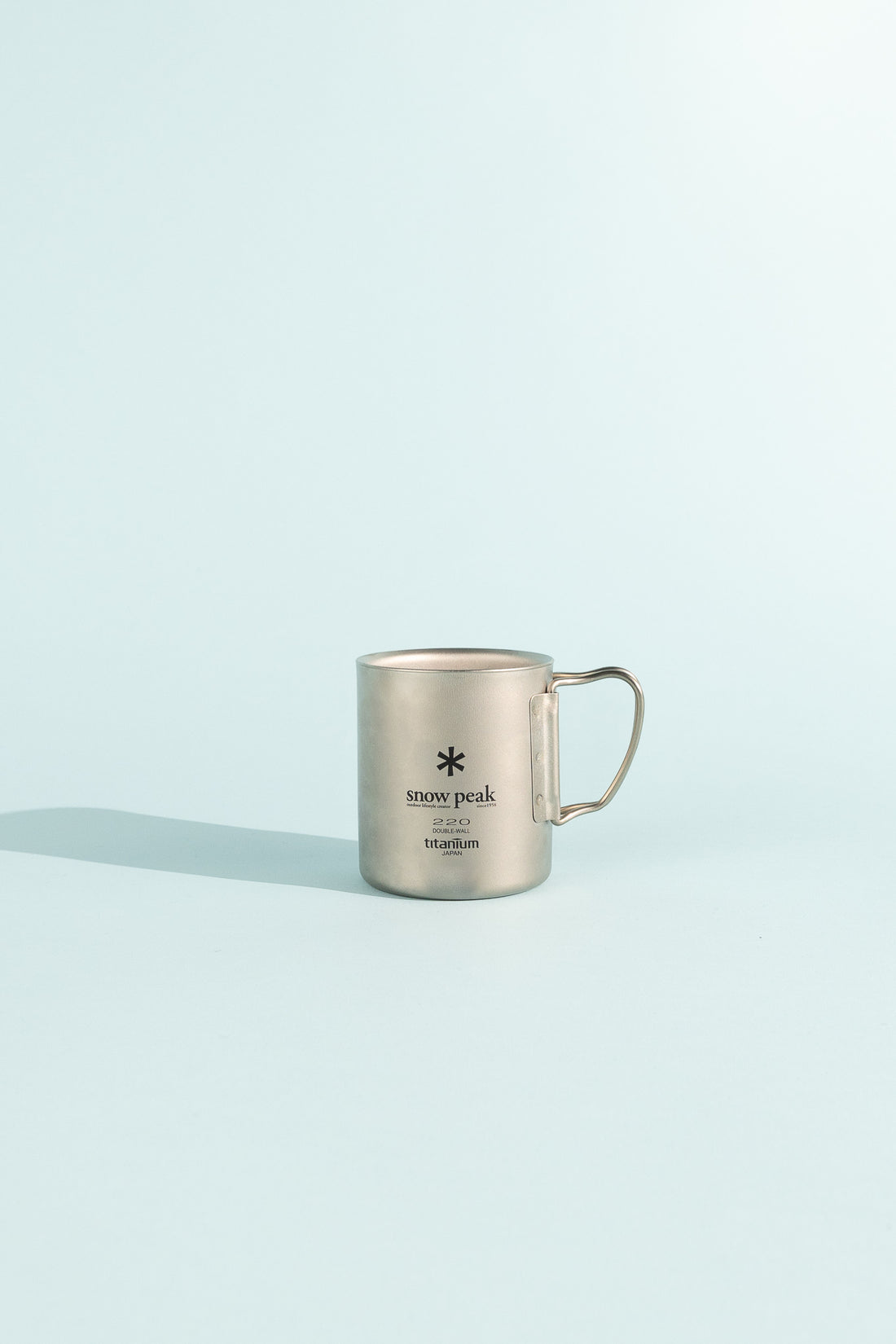 Titanium Double Wall Cup featuring lightweight design and durable construction for outdoor adventures.
