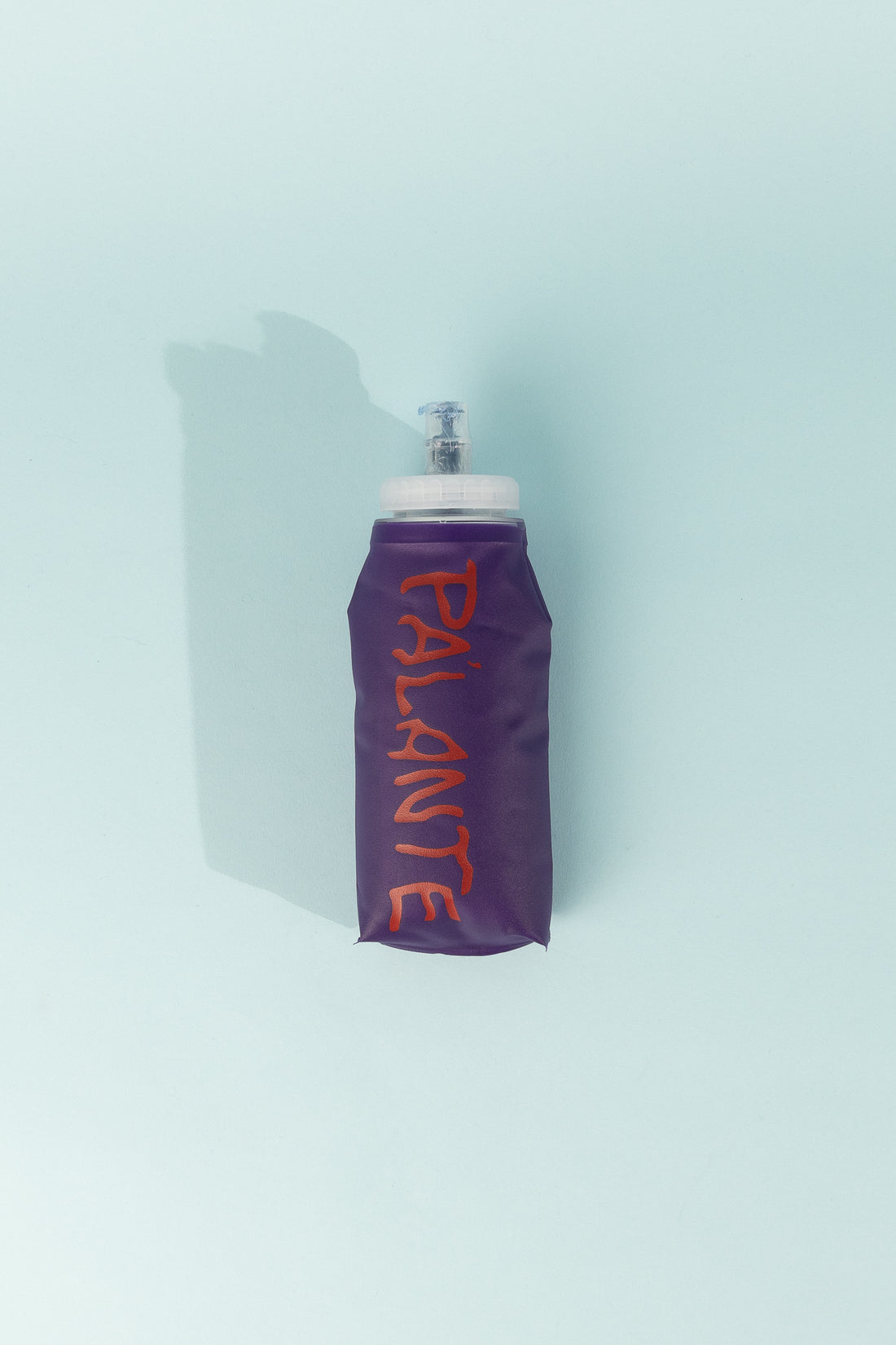 Floppy Water Bottle in purple with soft, collapsible design and wide mouth opening for convenience.