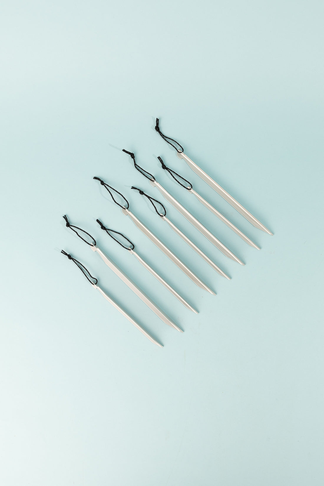 DAC Tent Stakes - Set of 8 tent J stakes with reflective drawstring for easy handling.