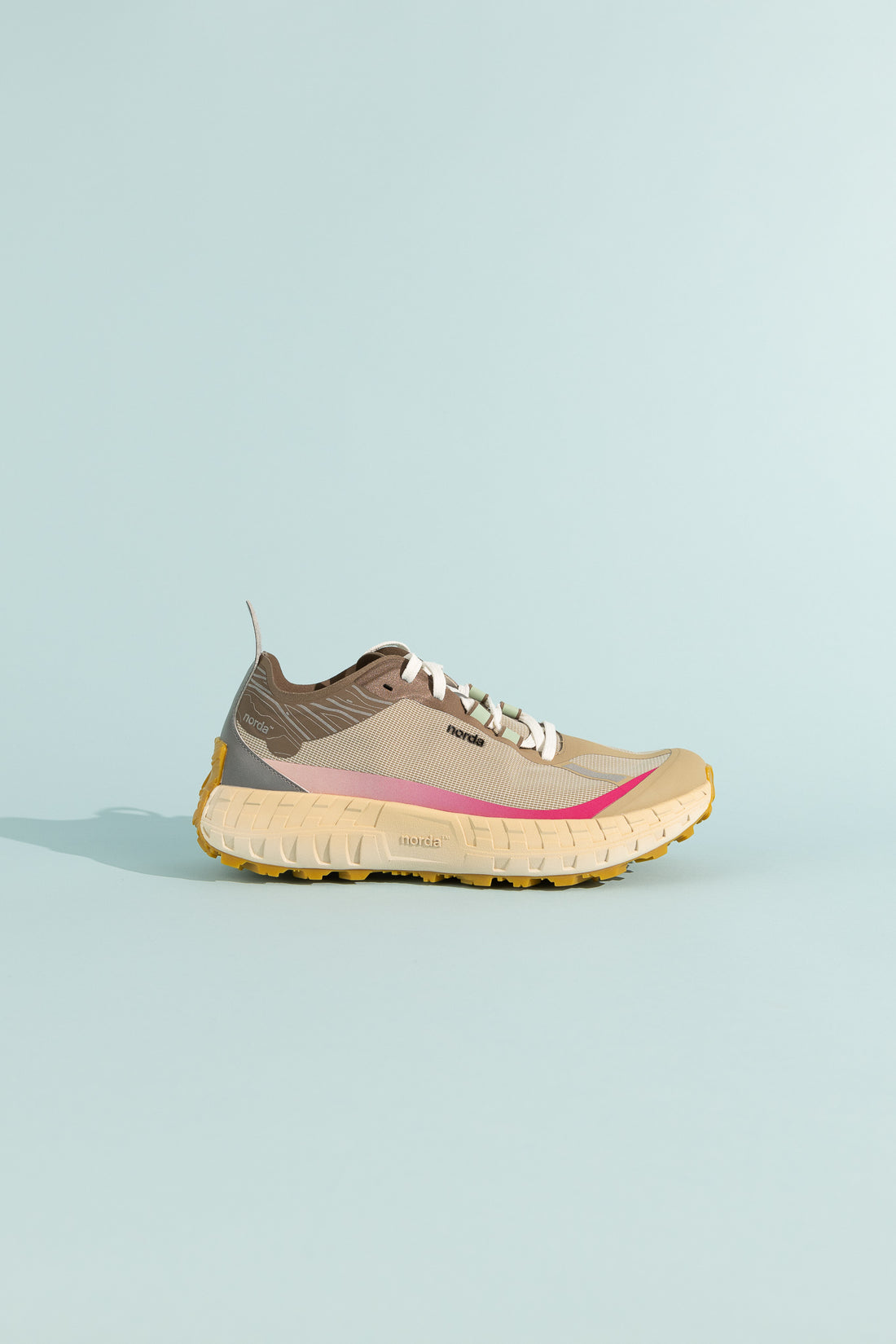 001A - Sky running shoe featuring Arnitel® TPEE® technology and a stylish design.
