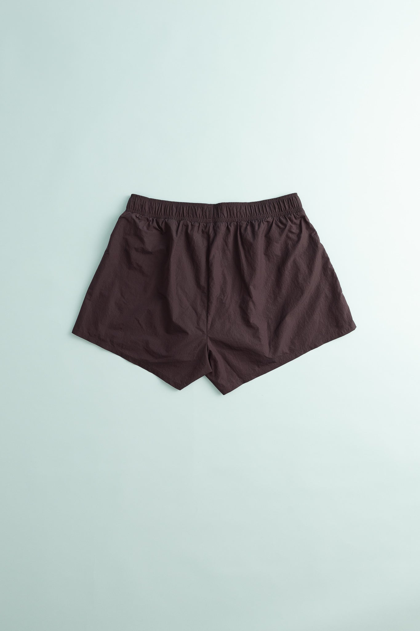 District Vision Womens Ultralight Nylon Zippered Shorts in Nightshade color, showcasing a lightweight and airy design.