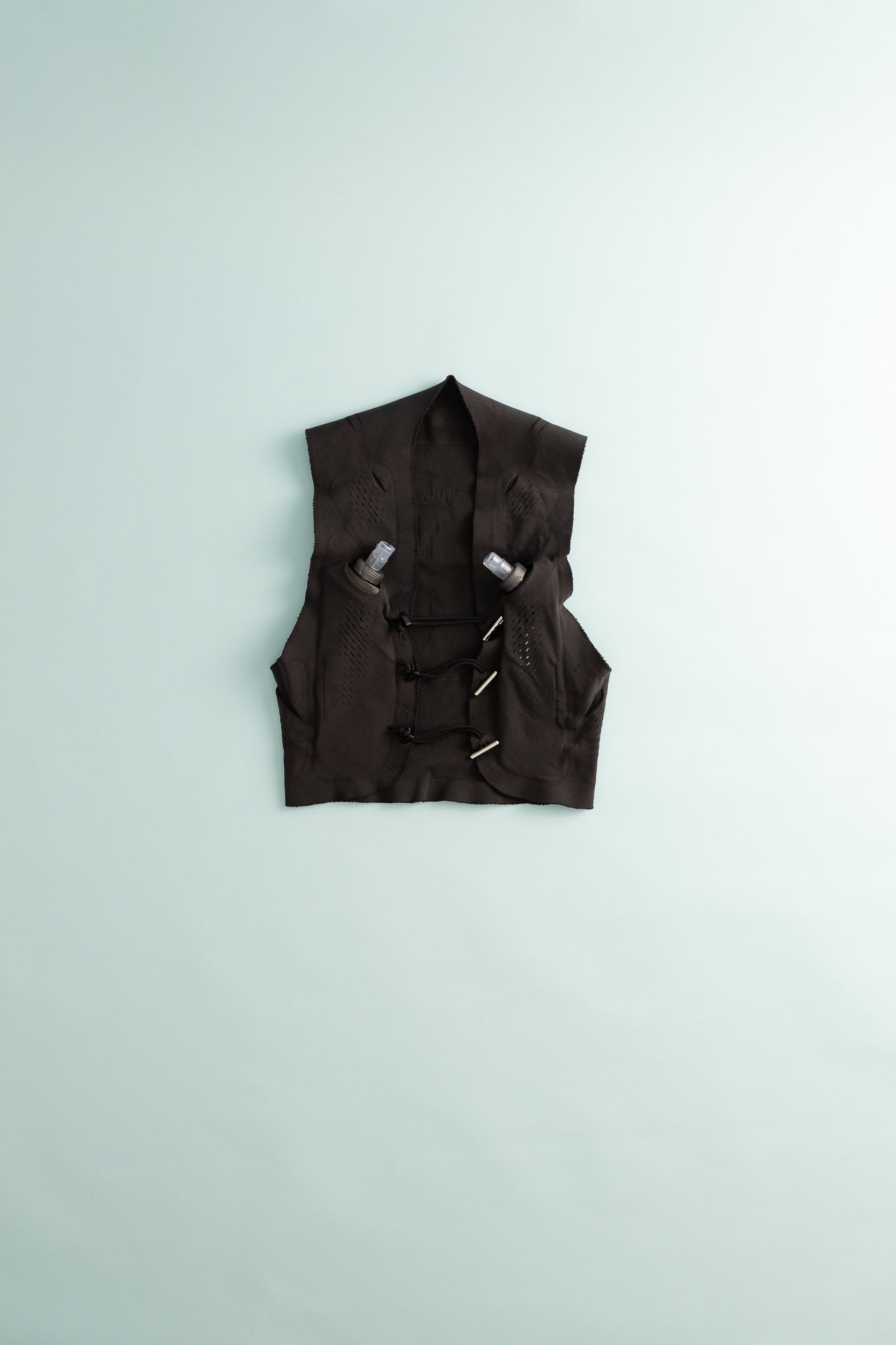 Warp Kit Vest - Anthracite displayed on a light background, showcasing its unique design and pockets.