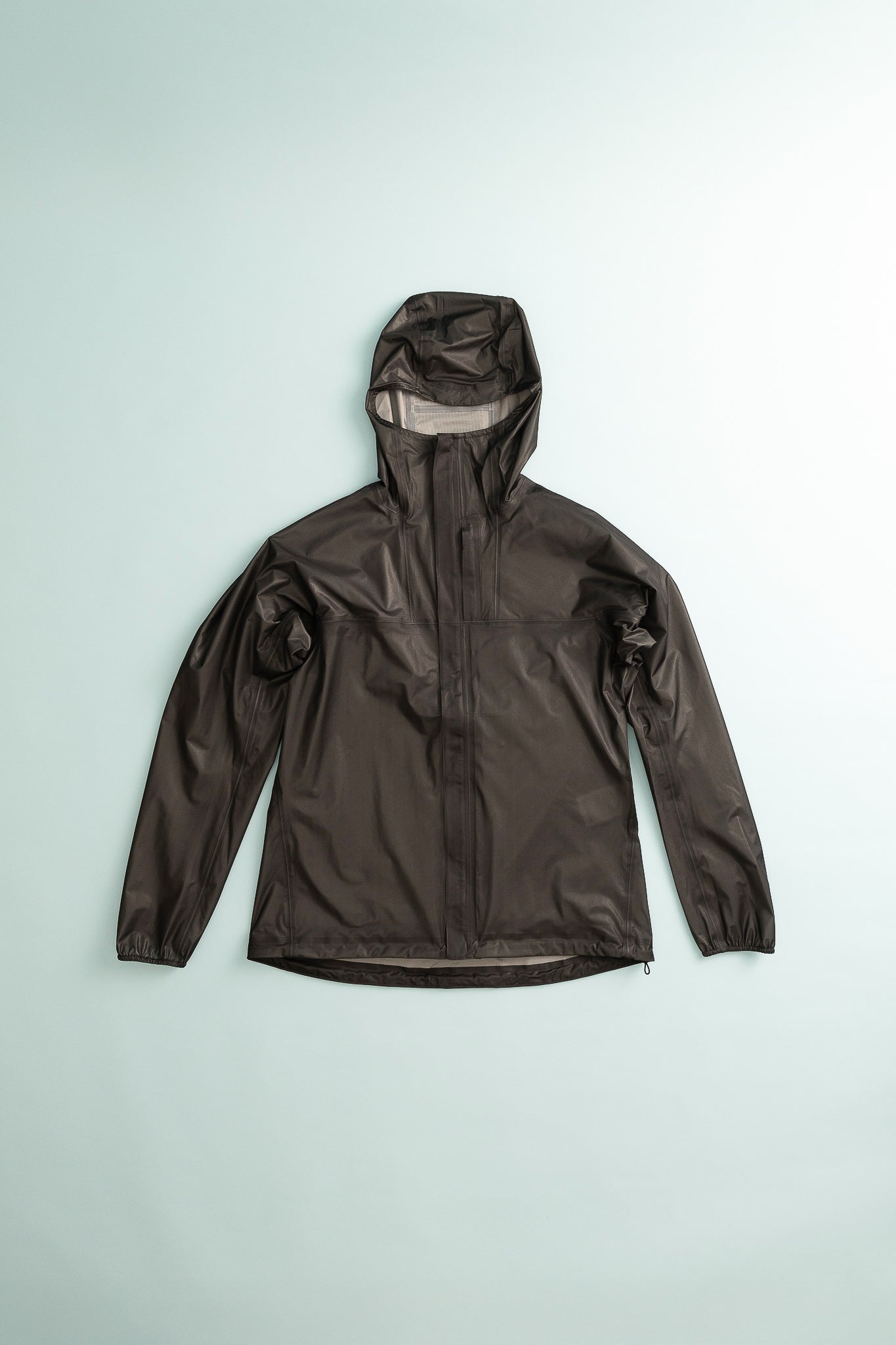Womens The Orange Jacket - True Black, fully waterproof stowable shell jacket for unexpected weather.