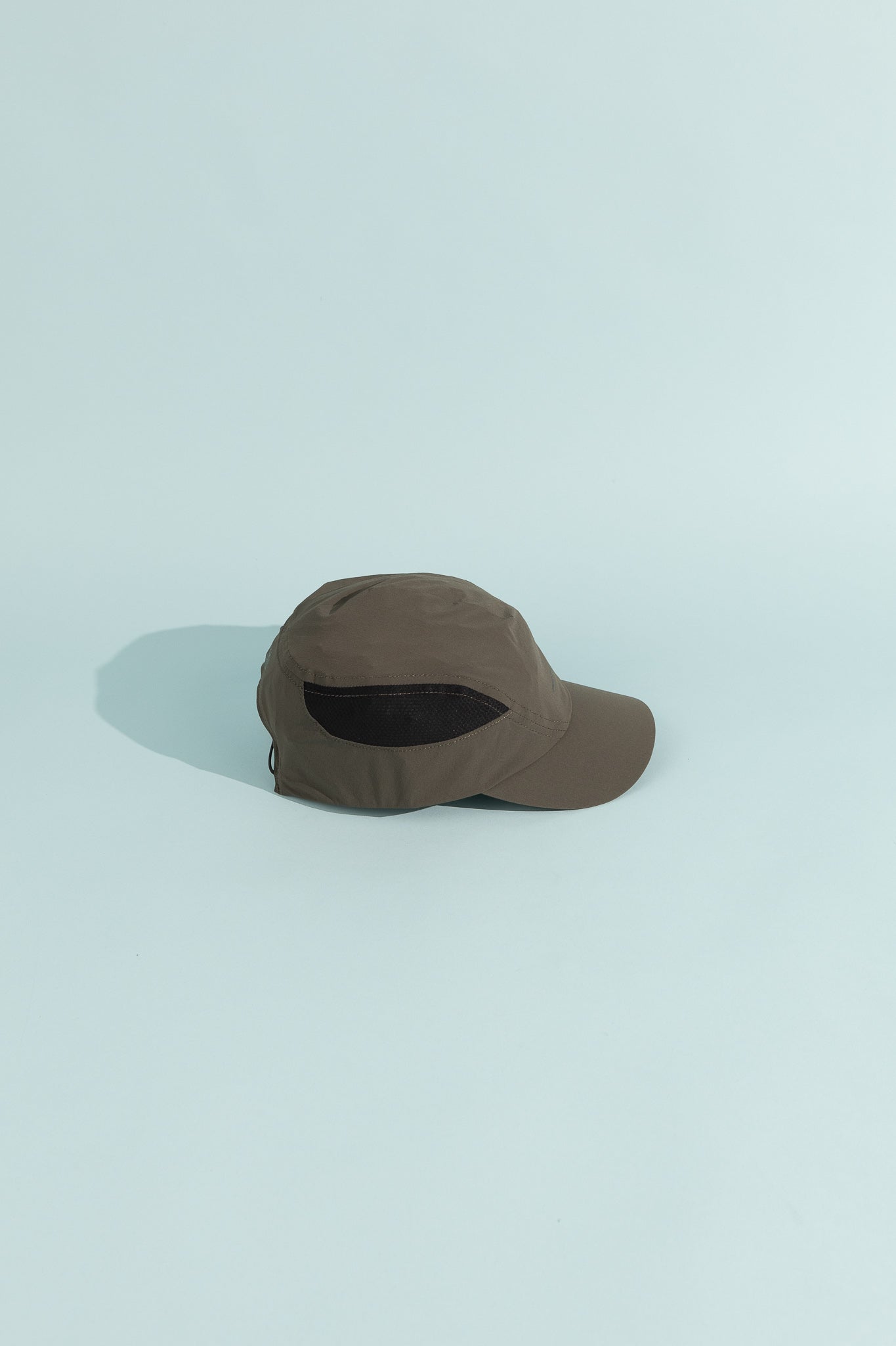 Planar Lightweight Cap - Beluga view from the side showcasing breathable mesh panels and lightweight design.